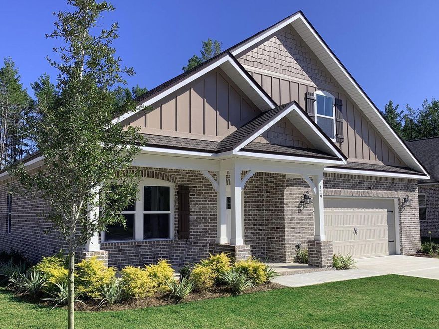 119 Leap Year Lane is a spacious home in the beautiful neighborhood of Seasons at Hammock Bay built in 2019. This home features both modern amenities and architectural character in a fantastic location. The Magnolia plan offers 3148 SF of living area including 4 bedrooms, 3 baths, a huge loft media room, stunning master suite, formal dining/flex room, breakfast nook, and a wealth of storage. Other notable features include a Rinnai tankless water heater for endless hot water, stainless Frigidaire appliances, gas cooktop, kitchen island bar, 42'' cabinets, granite countertops, laminate wood plank floors, crown molding, high-end porcelain tile in wet areas, and an oversized 2-car garage, plus numerous other upgrades.