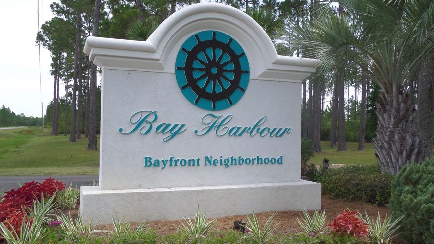 Come build your dream home on this spacious .68 acre lot in the beautiful bayfront community of Bay Harbour. The neighborhood is beautifully laid out and well maintained. Enjoy the community pier, boardwalk, lighted tennis court, separate storage, and beautiful ponds scattered throughout. The lot was recently bush-hogged so you can see the beautiful magnolia trees. A quiet relaxing retreat just a short drive from the beach, this is a great place to call HOME!!