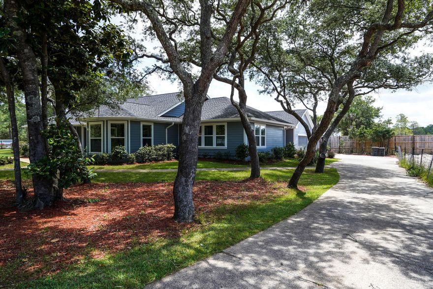 Ever dream of having your own private 'Enclave'? This absolutely beautiful, large private setting with a gorgeous home completely remodeled in 2019 has an Open Concept design & extremely comfortable Coastal Casual feel. The property is situated on 1 acre made up of to 1/2 acre parcels, adorned w/37 Spanish Oak trees, over 700 Linear feet of fencing w/electronic entry gate, and a NE corner driveway gate that accesses the wrap around driveway. Numerous upgrades must be seen to be fully appreciated, as the materials and craftmanship are both superior. Beautiful Brazilian Plank Tile has been laid completely throughout the home, with the living area walls being made of shiplap.