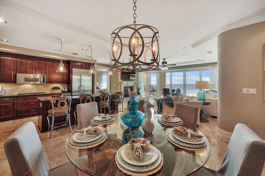 'PRICE REDUCED'This gorgeous Villa is poised perfectly on the 5th floor of Grand Dunes II with a 7th floor elevation and is decorated with an upscale ''Coastal Casual Design'' that looks absolutely beautiful. From the moment you walk off your semi-private elevator into your ''Private Foyer'', you will immediately notice the attention to detail taken to design this gorgeous unit, starting with the ''Faux'' finished front door. Features of this beautiful villa include: honed, sealed and polished travertine flooring throughout the living area, kitchen, hallways and baths, hardwood flooring in all bedrooms, upgraded lighting and fixtures,