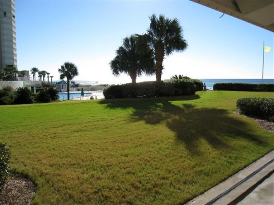 This is the one!  One of only a few true walkout units available in this complex.  Beautiful views of the Gulf of Mexico from both your patio, your living room and your bedroom. This beautiful and serene two bedroom condo is very convenient to walk right out to the pools and the beach. It has a well equipped kitchen with new cabinets, countertops, sinks, and lighting.  This condo has a comfortable coastal theme to the furniture, in the living area and in the bedrooms. The condo has flat screen televisions in the living room and both bedrooms. There is a king bed in the master bedroom and in the second bedroom is a queen along with a set of twin bunk beds.  It stays occupied and is rental ready. Amenities include two full-size pools and one of the most complete fitness centers on the coast.