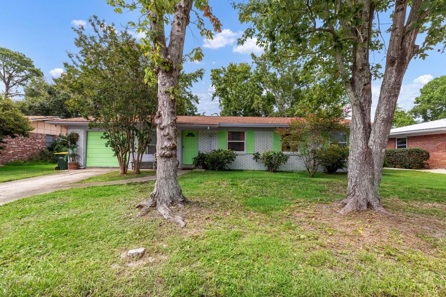 OPEN HOUSE SUNDAY 1-3pm.  All brick fully furnished 4 bedrooms and 2 bathrooms home is being run as a successful BNB.  Jan-Jun 2024 (6 months) earnings are $21,365.00.  $31,000 (for 10 months).   You have a 1 car garage to accommodate your guest's jet ski or kayak.  The owners did a great job in remodeling.  Open concept in the dining, living and kitchen. Sliding glass doors in the dining.  Great for natural light.  The kitchen has a door that leads to the back yard to make Grilling easy.  You have a hall to your right.  2 bedrooms are to the right of the hall with the full guest bathroom on the left of the hall.  At the end of your hall is the 4the bedroom.  large Master is to the left with your full bathroom.   Fenced in back yard.  Great furnished home or run it as a BN Seller is willing to rewire home before close.  Home is aluminum wiring.  Also, seller is willing to replace roof if it needs to be replaced for insurance.   