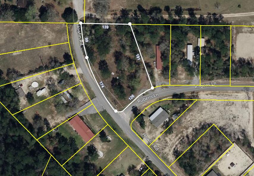 ***DOUBLE SIZE LOT!!***Are you looking for a larger than average lot to build your dream home?  This beautiful 3/4-acre lot may be just what you are looking for. Partially cleared, this lot is listed as a single parcel, but it actually consists of 2 lots combined. If desired, this lot can easily be subdivided into 2 separate buildable lots, each just over 1/3 acre or it can be kept as is for more usable space. Located at the end of Howlin Road in the Oakwood Lake Estates subdivision, this corner lot offers a quiet setting with minimal traffic. Mobile homes and manufactured homes are also allowed. There is an existing well and a septic tank on the property, but their condition is unknown. County water and electricity are available. and easily accessible.  For more information, call LA Chuck Roland at 850-685-2418.
