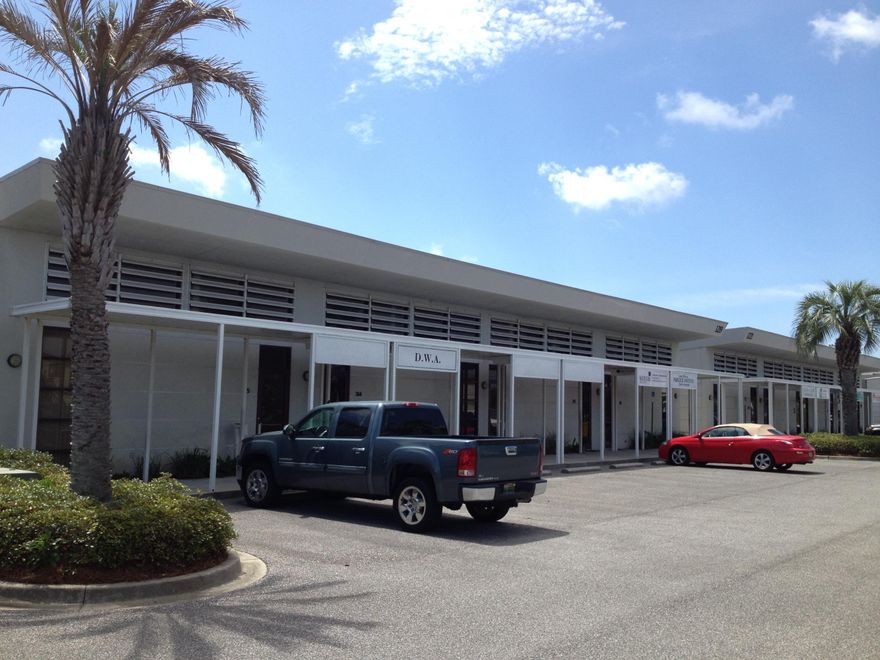 893 SF office space located on the rear of the office building. This unit has many floor to ceiling windows overlooking the natural vegetation. The space consists of a warm reception area, small kitchenette, one restroom and a large open area as well as one smaller office. This space is currently leased to a Jewish Synagogue. Lease expiration is 12/31/15. Please call for additional information regarding the lease.