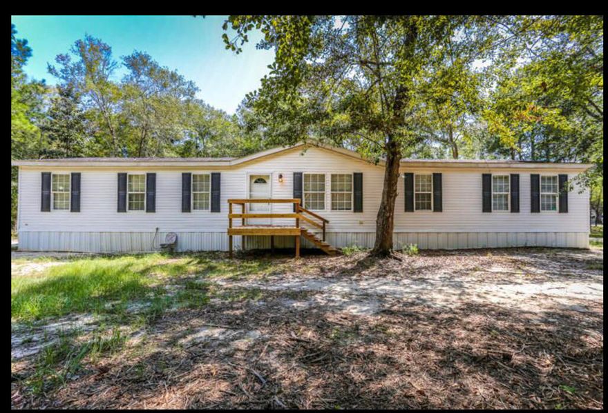 Large Family Home with over 2,000 sq.ft of living space. On over 3/4 of an acre lot.  Owner is motivated and says bring all offers now.