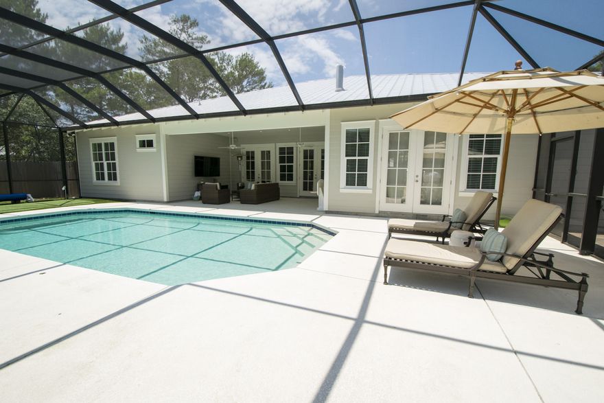 On one of the LARGEST LOTS in Seabreeze, this meticulously appointed home was RECENTLY BUILT BY SOUTHERN LIVING BUILDER Thomas Gallion. Every attention to detail has been given to this 2900s.f. home-including the outdoor living space! From SCREENED HEATED POOL, PERSONAL PUTTING GREEN, fenced yard w/ raised garden bed and 60'' TV & summer kitchen. Enter through the foyer w/ dining room and office on either side, into the huge GREAT ROOM with sliders leading to the outdoor living space. This home has 2 bedrooms w/ shared full bath, guest suite with private bath, and GREAT MASTER SUITE w/ luxurious bath & WALK-IN CLOSETS FROM HEAVEN! The 2 car GARAGE HAS A SEPARATE CONDITIONED ROOM for additional living space. It has everything you could want in a PERFECT FAMILY BEACH HOME!