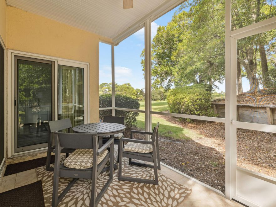 Set along the lush fairways of the Baytowne Golf Course within Sandestin Golf & Beach Resort, this turnkey, ground-floor condo in Tivoli offers effortless coastal living with serene golf course views and a rare, highly sought-after amenity: dedicated golf cart parking with a private charging station. This two-bedroom, two-bath residence with a bonus bunk room provides flexible sleeping accommodations, ideal as a primary residence, second home, or vacation rental. Natural light fills the open living area through new sliding glass doors, where beach-inspired furnishings complement the peaceful fairway backdrop. The updated kitchen features quartz countertops, a ripple subway tile backsplash, glass-front cabinetry, and a bright breakfast nook framed by floor-to-ceiling windows. Outdoor living is equally inviting, with a private courtyard perfect for morning coffee and a screened porch overlooking manicured greens and lush landscaping. The primary suite includes new furnishings and an updated bathroom with an oversized glass-enclosed shower, while the guest bedroom and custom bunk room comfortably accommodate family and guests. Additional upgrades include updated lighting, a new hot water heater, and a whole-house dehumidifier, ensuring year-round comfort and low-maintenance ownership. This move-in-ready villa also offers access to Tivoli's community pool and the full Sandestin lifestyle, including four championship golf courses, tennis, a marina, miles of walking and biking trails, and the shopping, dining, and entertainment of The Village of Baytowne Wharf. Whether you're seeking a low-maintenance condo in Sandestin, a rental-ready investment, or a relaxed Florida golf course retreat, this Tivoli residence stands out with its turnkey condition, golf cart convenience, and resort-wide accessibilitydelivering the best of Sandestin living with ease and style.
