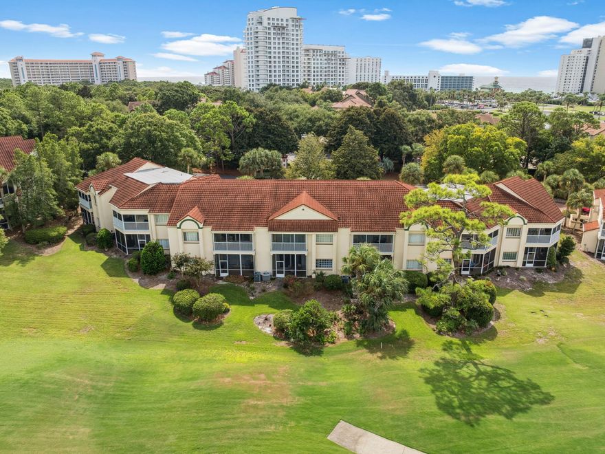 Set along the lush fairways of the Baytowne Golf Course within Sandestin Golf & Beach Resort, this turnkey, ground-floor condo in Tivoli offers effortless coastal living with serene golf course views and a rare, highly sought-after amenity: dedicated golf cart parking with a private charging station. This two-bedroom, two-bath residence with a bonus bunk room provides flexible sleeping accommodations, ideal as a primary residence, second home, or vacation rental. Natural light fills the open living area through new sliding glass doors, where beach-inspired furnishings complement the peaceful fairway backdrop. The updated kitchen features quartz countertops, a ripple subway tile backsplash, glass-front cabinetry, and a bright breakfast nook framed by floor-to-ceiling windows. Outdoor living is equally inviting, with a private courtyard perfect for morning coffee and a screened porch overlooking manicured greens and lush landscaping. The primary suite includes new furnishings and an updated bathroom with an oversized glass-enclosed shower, while the guest bedroom and custom bunk room comfortably accommodate family and guests. Additional upgrades include updated lighting, a new hot water heater, and a whole-house dehumidifier, ensuring year-round comfort and low-maintenance ownership. This move-in-ready villa also offers access to Tivoli's community pool and the full Sandestin lifestyle, including four championship golf courses, tennis, a marina, miles of walking and biking trails, and the shopping, dining, and entertainment of The Village of Baytowne Wharf. Whether you're seeking a low-maintenance condo in Sandestin, a rental-ready investment, or a relaxed Florida golf course retreat, this Tivoli residence stands out with its turnkey condition, golf cart convenience, and resort-wide accessibilitydelivering the best of Sandestin living with ease and style.
