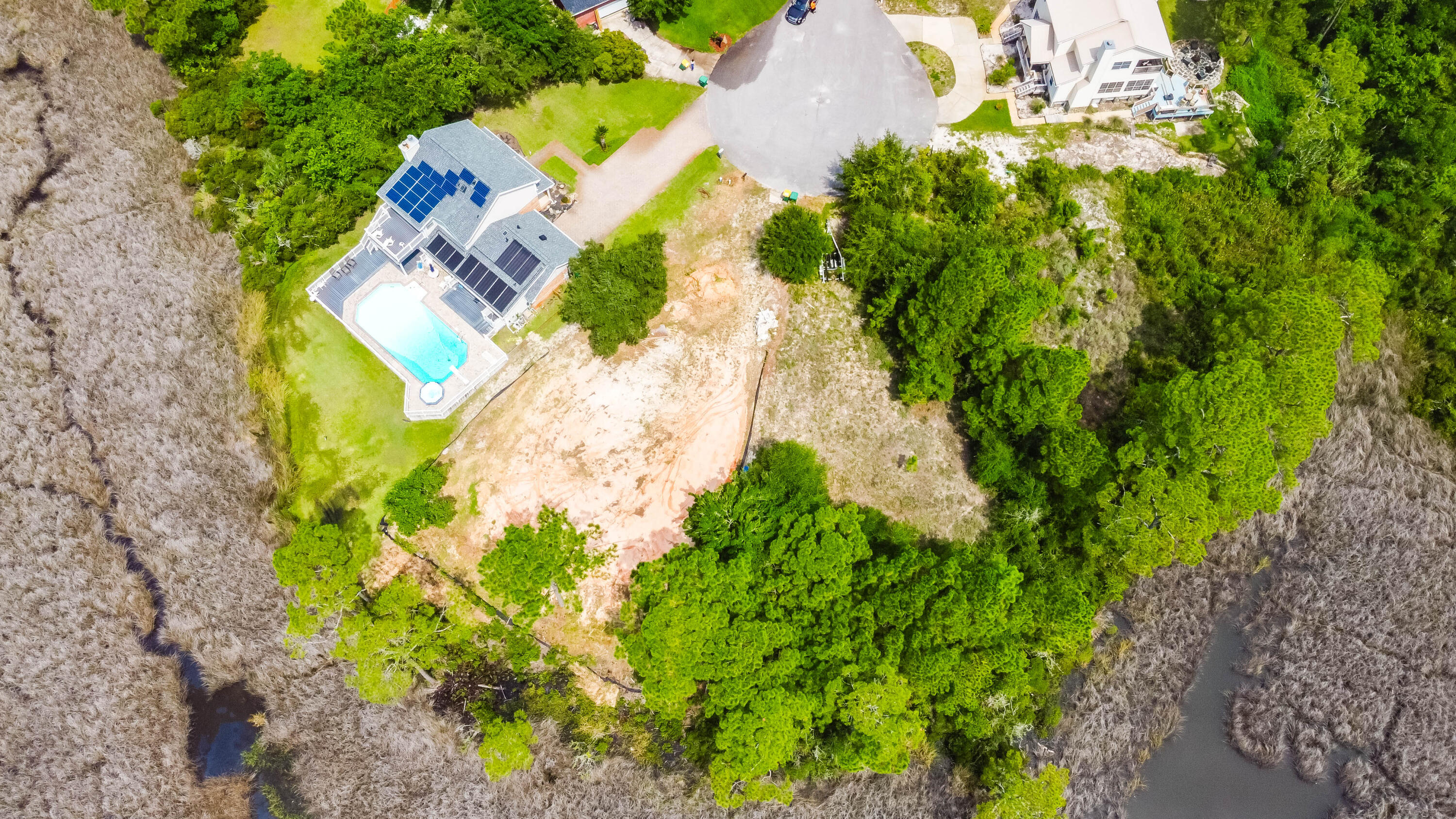 This .37 acre lot is one of a kind and is ready to build your dream home. It has panoramic views of Intracoastal waterway. All the leg work has been completed to include: Boundary Survey, Elevation Cert., Soil test, Water absorption test, Storm water drainage plan, Water and Sewer connection fee, (water currently on site) and Signed Fire Certificate .Building permits, building plans, Survey and engineering is also available to the new buyers.