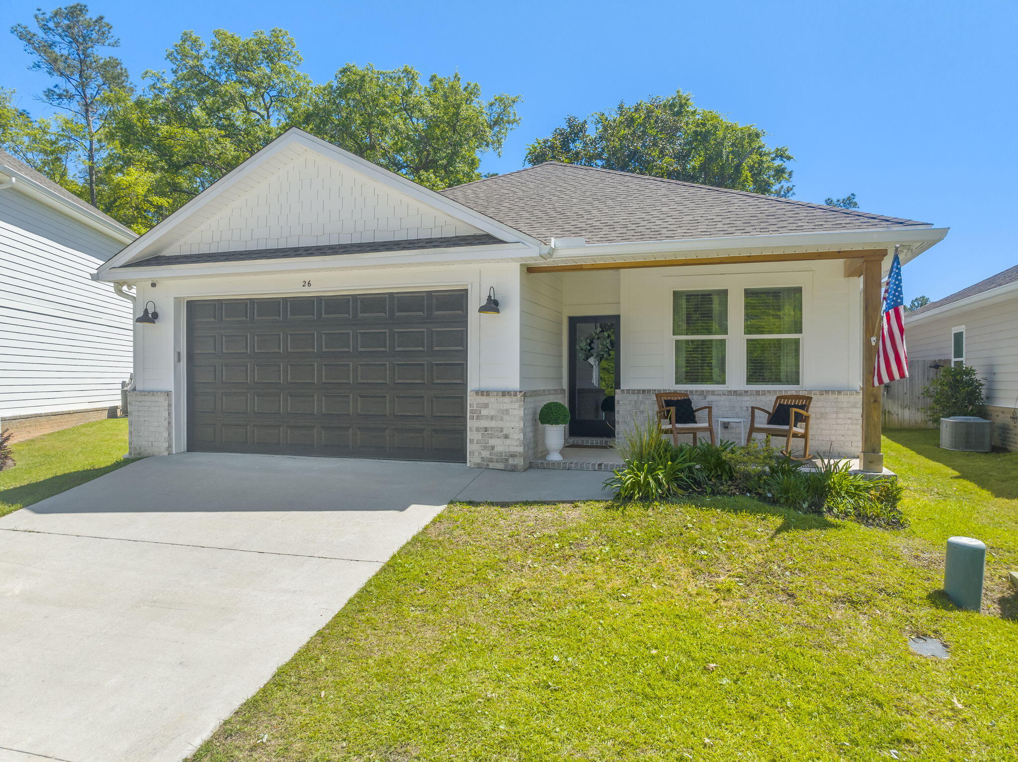 Welcome to 26 Sandywoods Ct in Freeport, FL! Located on a cul-de-sac, this charming 3-bedroom, 2-bathroom home offers a cozy retreat for those seeking a modern home with an abundance of custom accents and upgrades. The house features shiplap accent walls that add a touch of character to the living space, master bedroom and bathrooms. Step outside to enjoy the fenced back yard, perfect for relaxing or entertaining guests. Residents of this community have access to a playground, community pool, and fishing dock, as well as a community path leading to the creek which opens up to he bay! Don't miss out on the chance to make this lovely house your new home!**Pink bathroom accent wall to be painted neutral color