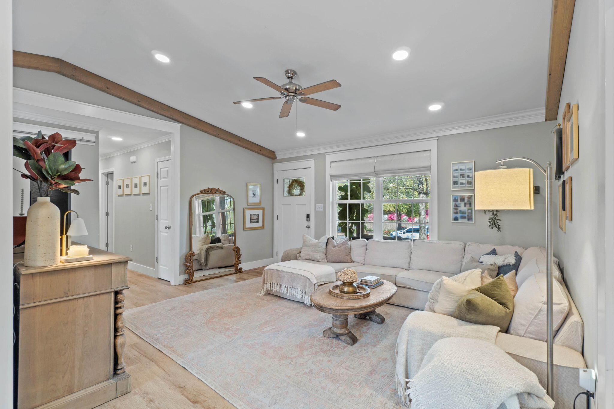 *VA assumption available at 2.99%* Welcome to this absolutely adorable fully renovated 4 bedroom/2 bath cottage. With custom finishes like exposed wooden beams, luxury vinyl plank flooring, crown molding, and shiplap prepare to fall in love with this gem and have peace of mind with a roof, HVAC, and water heater all installed in 2021! Enter into the long driveway and appreciate the tucked away retreat with a cozy front porch. The charming interior is full of updates and the living room features a vaulted ceiling, recessed lighting, and a shiplap accent wall. There is not only an eat in kitchen space that leads to the fully updated kitchen but there's a formal dining room as well with a wooden accent wall. The kitchen is a dream with stainless appliances, butcherblock countertops, tasteful backplash, a range hood, & custom cabinetry. You'll also love the window over the large single basin stainless sink overlooking the large backyard. There is one bedroom on the left side of the house along with an interior laundry room that leads to the backyard. The owner's suite is updated with crown molding and recessed lighting with a walk in closet, and the lovely bathroom is fully renovated with a walk in tiled shower. The other two nice sized bedrooms are appointed with the same attention to detail! The second full bathroom is another beautifully updated space complete with a gorgeous double vanity with framed mirror, shiplapped walls, a linen closet, and a fully tiled surround shower/tub. Outside enjoy your own space without a neighbor on top of you! There's also plenty of storage space with a 24x14 workshop complete with power and an additional storage building within the fully fenced in backyard!