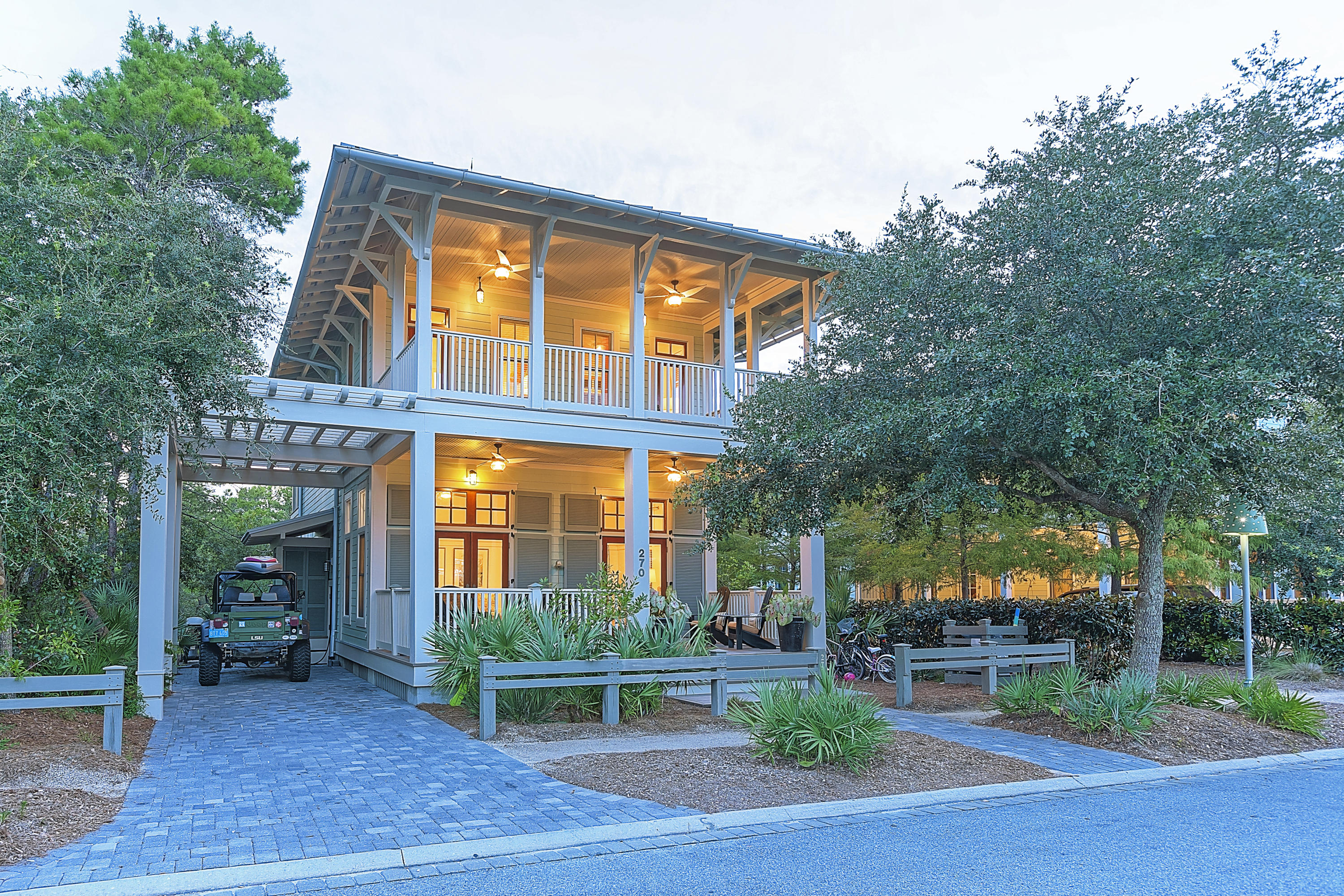 Lovely three bedroom beach cottage boasts one of the best locations in Watercolor! Upper and lower screened porches overlook one of Watercolor's most beautiful nature preserves. It is just a short walk to the tennis courts, pools, Camp Watercolor, Seaside, and nature trails with easy access in and out of Watercolor. Beach access to the Gulf is just a quick bike ride or walk as well. This beautiful home features four large porches: two open porches on the front and two screened on the back. The upper screened porch can be accessed from the spacious master bedroom with ensuite bath. Two other bedrooms, each with their own bath and front porch access complete the second floor. Walk up to the third floor crow's nest and enjoy expansive views of Watercolor and the nature preserve and