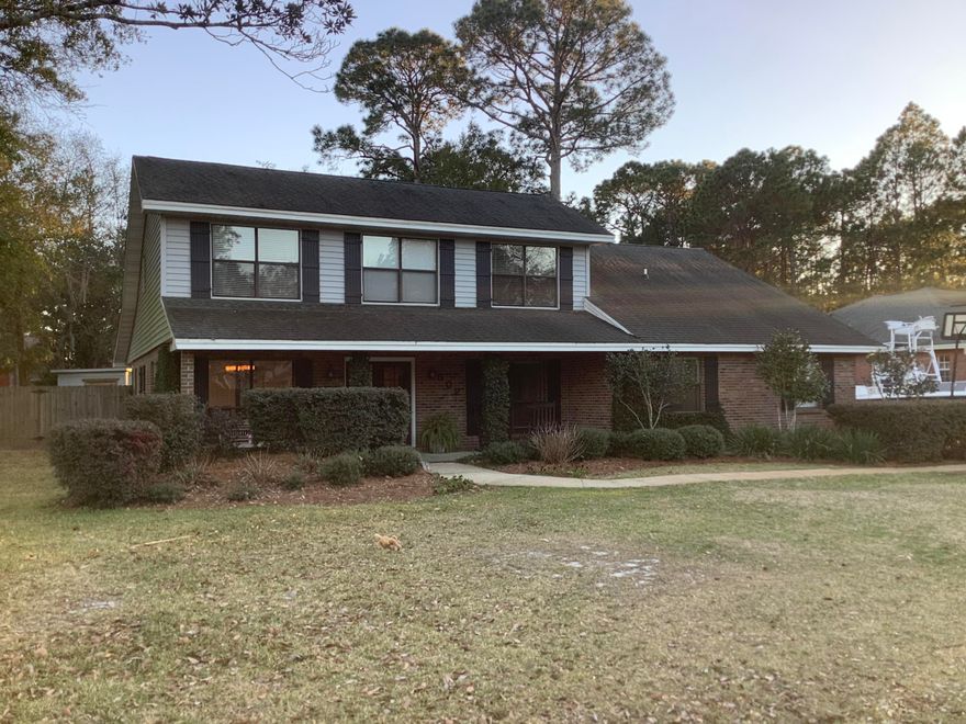 5 bedrooms are hard to find and this particular UPDATED home even has a downstairs Master suite. This lovely home's additional features include a grand living room plus den with french doors, oversized fenced lot, big front porch, and screened in rear porch. Gorgeous fully updated kitchen with attached breakfast area & separate dining room will impress any chef. Grand Master suite with room for large furniture and master bath with double vanity will be your private oasis. There is also a 2 car side entry garage with at least extra parking for 3 additional cars. This will be a perfect place for anyone looking for a spacious home with an abundance of living space! This home is conveniently located with an easy commute to Eglin AFB and beautiful Destin beaches....close to everything!