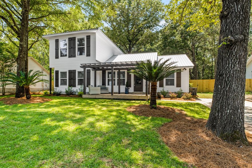 Beautiful updated home with all the modern touches. You will love walking through the pergola covered entry  into this totally renovated contemporary home. Freshly painted throughout. The kitchen has new countertops, cabinets and stainless steel appliances. The baths have all new fixtures, vanities and quartz counter tops, and flooring. There are all new light and plumbing fixtures throughout. New contemporary luxury vinyl planks makes this home so warm and inviting with new carpet upstairs. The exterior has new sod and beautiful landscaping Buyer to verify all pertinent information including sq. ft. and lot dimension.