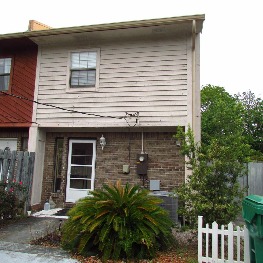 Delightful End unit Town home... featuring a roomy living/dining room combo opens up to a covered patio, which is fully fenced. Kitchen is large, with plenty of cabinets, and indoor laundry room. Master bedroom features walk in closet and private balcony. Storage is not a problem in this town home, extra storage under the stairs as well as an attached storage shed. Large driveway to park your RV or Boat. Seller has replaced all major items, roof, HVAC, Hot water heater... Now is the time to own your own bright, cheery home sweet home.