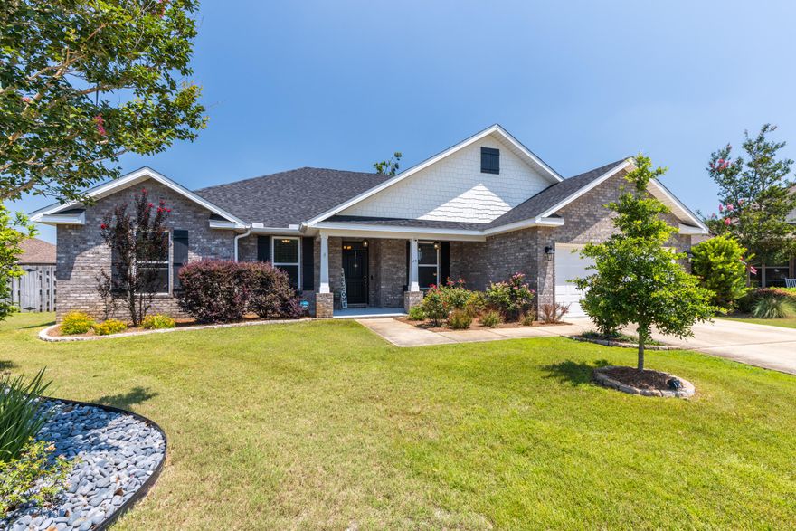 INCREDIBLE $30K TOTAL PRICE IMPROVEMENT IN HAMMOCK BAY!! ACT NOW!  Welcome Home to this Marvelous 4 Bedroom, 3 Bath & Flex Room/Office (2,444 sqft), brick home located in the Brighton Community of Hammock Bay on large .28 acre lot with huge fenced in back yard space big enough to add a pool. Owner has invested $21,167 in upgrades.

From the moment one drives up... this speaks... we are home!! The lovely 4-sided low maintenance brick home has a front sitting porch and plenty of driveway parking as well as 2-car garage space. As you walk in the front door into the grand foyer entrance, this Charleston floorplan greets you with a beautiful 20' x 17' living room with coffer ceiling, hardwood LVP floors and an abundance of large windows ushering in lots of natural light. The large open concept kitchen, dining and living room areas create a wonderful flowing living space for everyone. Among its features: Eat-in island, 42" kitchen cabinet, granite countertops, beautiful backsplash, stainless steel gas stove, microwave, refrigerator and dishwasher.

This home features a popular split floor plan. The primary bedroom makes for a lovely retreat featuring a significant sitting area and/or nursery room, coffer ceiling and large windows offering lots of natural light as well. The spacious primary bathroom is established with double vanities, garden tub and separate shower with a large primary walk-in closet. The other (3) bedrooms offer plenty of space and all the closets are decent size. Home office/Flex room with glass French doors and separate formal dining.

LVP flooring in Master bedroom, all bedrooms, family room, dining room and office. Kitchen, Foyer, Laundry room and bathrooms have tile flooring. Crown molding in the foyer, living room and dining room. Very nice laundry room.

Upgrades include: Installed Backsplash in Kitchen, Replaced Carpet in all Bedrooms to LVP flooring, Screen-in Porch, Installed Gutters, Installed Glass door on Master Shower, Additional Landscaping including backyard pavers, Installed Pull down Attic Stairs, Added Ceiling Fans, Replace Thermostat with new, Samsung Stainless Steel Refrigerator with icemaker with extended warranty (Feb 2022) and Installed Privacy Fence.  Over summer seller installed a beautiful outdoor patio upgrade for outdoor space.

Looking for an indoor/outdoor space to chill or fenced in backyard big enough to create. One can relax on the screen-in patio reading and sipping your favorite drink. The back yard is so roomy that everyone can utilize the back yard. It offers enough room for pool, planting favorite fruit trees & gardening, and space for kiddos and pets to enjoy!  

The roof has a solar ventilation fan as well.

The home has a 10 yr transferable Structural Warranty that was obtain in 2018. This structural warranty is transferable to the new buyer and it will expire in 2028.

**Huge Backyard that is leaves plenty of room to install a pool!

That's not all!! You will fall in love with Hammock Bay a premier master planned residential community located along Highway 20 renowned for it's unparalleled amenities. This 3,200 acres serene community is a unique, sought after and environmentally responsible community that offers a one of a kind lifestyle for residents of all ages, a 25 meter lap pool and two (2) resort-style pool), 4000 sq.ft. state-of-the-art 24-hr fitness center, lighted basketball, tennis and pickleball courts, dog park (provides an outdoor doggy-washing station and drinking-bubblers), a beautiful private clubhouse for parties and other functions complete with a full kitchen and a private theatre. There are putting greens, picnic and outdoor cooking facilities, a gorgeous gazebo, outdoor theatre with courtyard, and a lovely General Store. Many wonderful community events are held here throughout the year including a monthly Farmer's Market! Miles of serene walking and hiking paths, green spaces, stocked ponds and a private bay club with 480' of shoreline on the Choctawhatchee Bay and 500 ft. long dock with boat moorings and fishing pier. Amenities come with keyless access and campus security.

A Town Square-lawn-style amphitheater is designed for gatherings and events held throughout the year! We invite you to take a tour of this lovely home and experience first-hand the Hammock Bay "way of life!" There are many functions held through-out there year bringing the community together as well.

Freeport is a vibrant, growing community on Choctawhatchee Bay, less than 30 minutes from the famous Emerald Green Gulf Coast beaches, 30A, and all the activities, dining and shopping that make this a special place! Easy commutes to beaches of South Walton, Destin, Niceville, major airports, Eglin and Hurlburt Air Force Bases, discover what makes Hammock Bay so fabulous!

There is 60-acre Sports Park featuring a multitude of ball field/park amenities on property adjacent to the east of this community.

***Washer and Dryer to not convey.

Buyers to verify all dimensions and property information of importance.