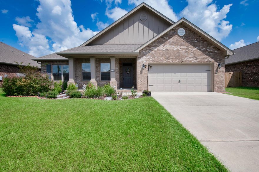 REDSTONE COMMONS ''HOLLY'' NOW AVAILABLE.. and there are ONLY 4 of these floorplans in the neighborhood! Homes in Redstone Commons continue to be highly sought after because of the KIDDIE PARK.. DOG PARK.. CLUB HOUSE.. ANNUAL CELEBRATIONS.. AND THE COMMUNITY POOL! This 4 BR/2 bath ''all brick'' traditional sits on a premium lot.. located right around the corner from that infamous pool. It also comes with it's own pool-- a Summer Waves ''above ground'' tropical oasis that will convey. Inside the home, you'll find stacked tray ceilings.. with inlay moldings.. and recessed lighting. The luxury vinyl wood flooring and paint are neutral.. pairing well with the rich ''espresso'' kitchen cabinetry.. and SS Samsung ''Smart'' appliance suite. Gorgoeus granite.. elongated island.. and designated dining space are also a plus. Arched doorways lead to different areas of the home.. including the spacious master suite. The master bath features a deep-set garden tub.. custom tiled shower (with bench seat).. more espresso cabinetry with elongated vanity.. and an ENORMOUS master closet. All remaining bedrooms are carpeted with large closets; one of them a walk-in. Outside you'll find a lofted barn-style shed, with metal finish.. elevated garden stands..extended rear patio (perfect for grilling).. 12 foot offset umbrella with LED lighting.. large capacity storage deck boxes.. new landscaping.. and new gutters! City water.. city sewer.. and the washer/dryer convey. Owner hates to sell.. but duty calls! Priced to move... make an offer today!  