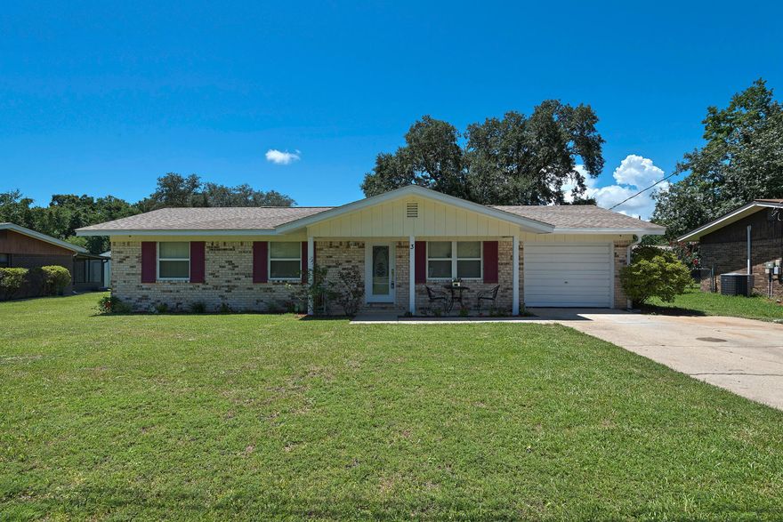 Stretch you dollar on this well-cared-for home that is in Move-in condition and is AFFORDABLE! Owners have lovingly upgraded and maintained this home located in a perfect Shalimar neighborhood. The new dimensional shingled roof was installed 2004. Double-paned windows installed throughout home. A new hot water heater installed in 06. The bathrooms are recently updated with fresh paint and flooring in both baths and new cabinetry and refinished tub and enclosure in hall bath. New kitchen. New laminate wood flooring in kitchen, dining room, den and office. New 6 panel interior doors installed. Crown molding.