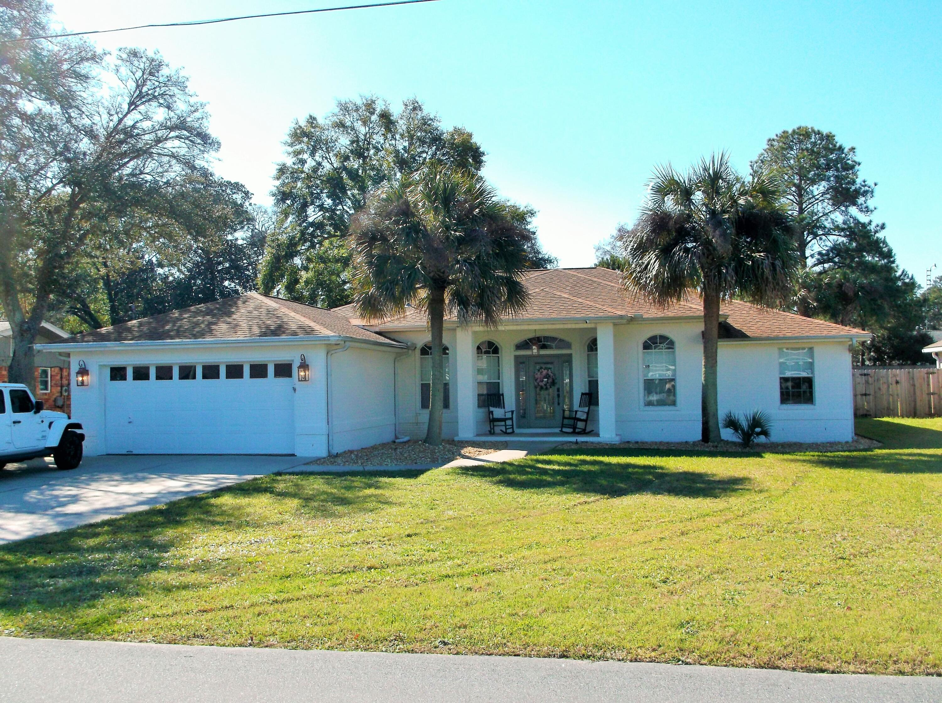 Short walk to neighborhood waterfront park w/Boat ramp. Brick home with split bedroom plan, w/4 bedrooms & an office/study. Living Rm w/ electric fireplace, breakfast nook & dining Room w/chair rail. Tile floors in all bathrooms, foyer, living room, kitchen, nook & laundry area. Smart Core waterproof wood laminate in Dining Rm & Study in 2021. New Roof in 2023; in 2021 upgraded AC & HWH and appliances. Primary Bedroom has single trey ceiling w/crown molding & recessed lighting; primary Bath has jetted garden tub, separate marble shower, double vanity & walk in closet. Decorative full glass entry door & side lights & clear transom. Crown molding in Foyer, Living Rm, Dining Rm & Kitchen. Rear covered patio & a 12 x 14 Shed in Backyard. Exterior painted in 2023. new carpeting in 2023.