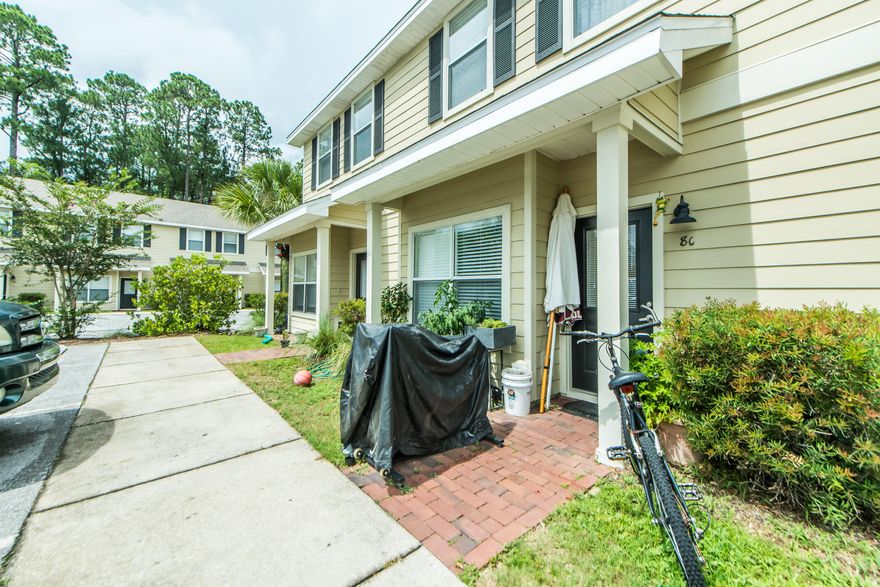 The Palms of Freeport is a low density community of town-homes nestled between trees and lush foliage with great amenities including a park, pool and pool house. The Palms of Freeport are located 15min from the beach and all major shopping malls. This unit has granite counter tops, solid wood custom cabinets, 18 inch tile in kitchen, hardwood laminate throughout the living room, travertine counters in bathrooms, New Orleans style paver entry ways, upgraded lighting package, wooden decks on the back of each unit, plenty of storage, large bedrooms, and spacious floor plan. The owner is offering $2500 towards buyer closing costs and prepaids.