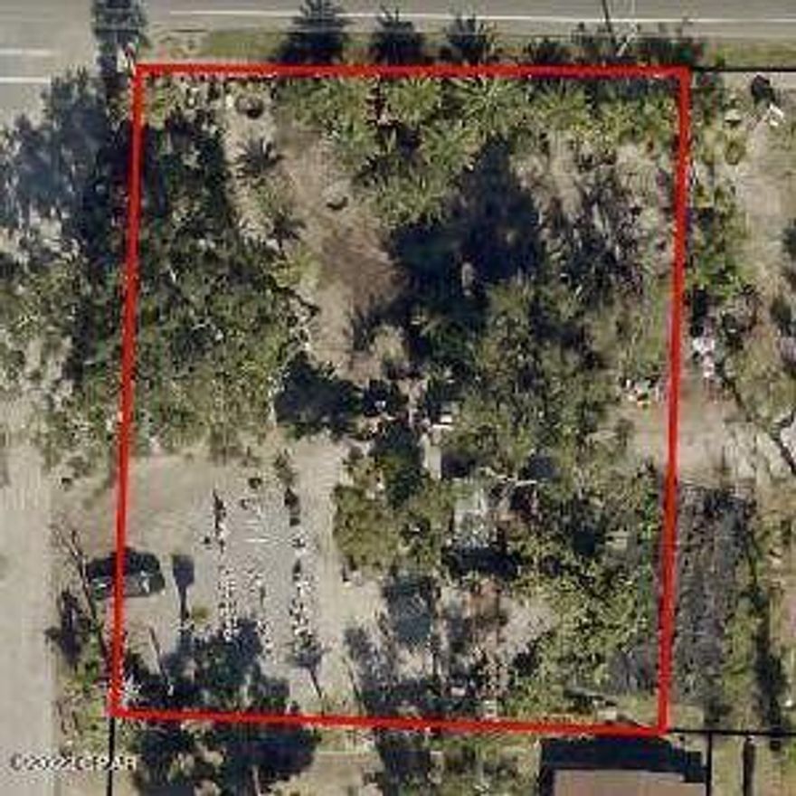 This high traffic count parcel sits right on Hwy 98 as you are entering Panama City from Panama City Beach. The property is ZONED C-2 GENERAL COMMERCIAL allowing for a large list of allowale usages. Which includes Restaurants, retail, auto repair, & Business Professional. The parcel sides on 2 streets  allowing for excellent ingress and egress. It is on the main corridor frontage you have to drive by as you head to popular areas in St. Andrews Historic Entertainment areas. Close to the Downtown District, too!  The parcel located at 3701 Hwy 98 can also be purchased to make for a larger parcel to build your business.