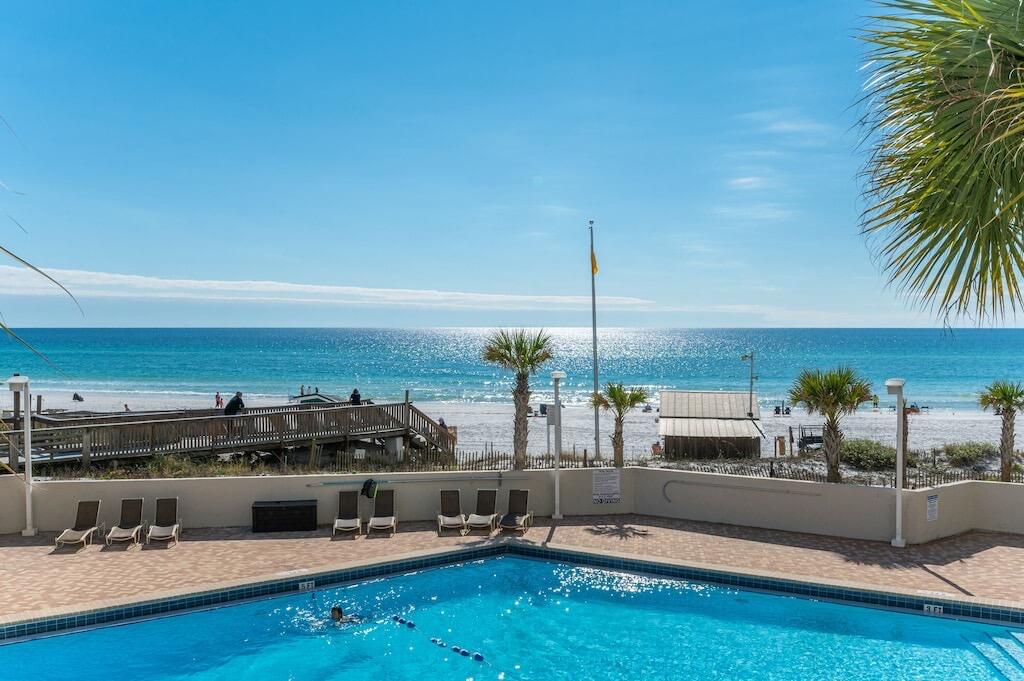 Experience the serenity of gulf views and pristine white sand beaches right from your very own private condo! Nestled on the second floor, this charming two-bedroom, one-bathroom haven boasts a fabulous view overlooking the Gulf of Mexico. With convenient beach access via the condo's boardwalk and a relaxing pool deck just steps away from the dunes, you're moments from indulging in our renowned white sandy shores. Inside, discover a cozy and inviting ambiance with an open floor plan seamlessly connecting the living, dining, and kitchen areas, with incredible floor-to-ceiling views through sliding glass balcony doors. Recently refreshed, this condo presents a coastal chic new look and eagerly awaits its new owners. Sold fully furnished and rental ready, this property is an excellent investment opportunity, a perfect vacation retreat, or an ideal full-time residence. Beachside Two Condo just finished an exterior and common area renovation, ensuring a superbly maintained and appealing environment for all residents.
Sandestin Golf and Beach Resort features abundant amenities including 5-Star golf courses, tennis, biking and hiking trials, a 113 slip marina, and the exciting Baytowne Wharf for restaurants and shopping. The ever-growing Grand Boulevard Town Center featuring Emeril's and other great restaurants, as well as retail shopping, Starbucks, a movie theater, and Publix Grocery is a short golf-cart ride away.