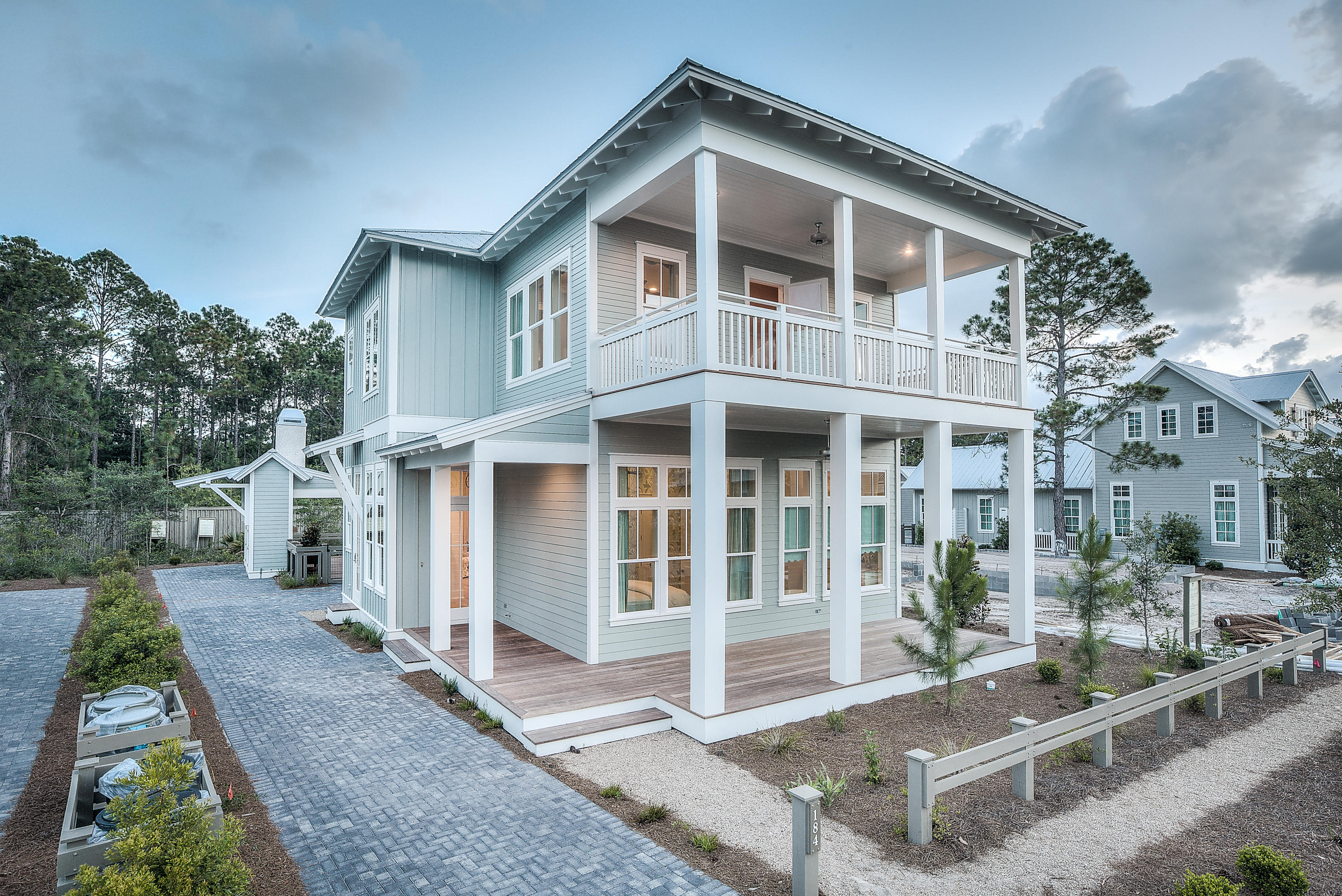 This new Romair home located in Watercolor's Crossings District offers 2894 square feet, 4 bedrooms, bunk room, 4 full baths/2 half baths and full size laundry room with sink. Features include: 12 ft. ceilings, hardwood flooring and Carrera marble countertops throughout, white Quartz countertops in kitchen and laundry, Coastal Living cabinetry with glide drawers/doors, Wolf, Sub-zero appliances in kitchen, ice maker and wine fridge. Beautiful outdoor pool, fireplace, cabana, and Cumaru decking. Amenities include: community pools, Beach Club, nature trails, kayaking, canoeing, fitness center, tennis and Camp WaterColor. Centrally located to the best dining, unique boutique shopping, bike paths and some of the most challenging golf courses the gulf coast has to offer.