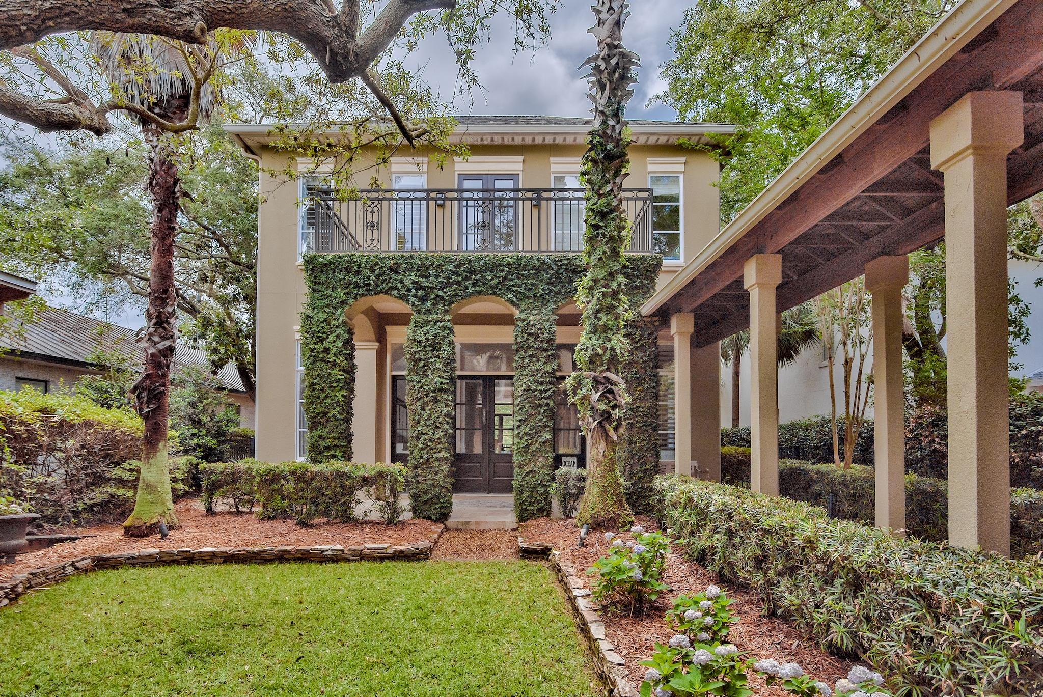 Property is currently UNDER CONTRACT, however, Seller will accept back up offers until buyer removes contingencies.An infrequent opportunity to own and enjoy a truly private, gorgeous home and carriage house on Joe's Bayou in Destin.This stunning bayou home has panoramic water views with Bay and Gulf access!Includes a boat lift and deep water boat slip.An extremely private drive leads to the detached garage/Carriage House. The main home is located directly behind, separated by a courtyard and covered walkway.