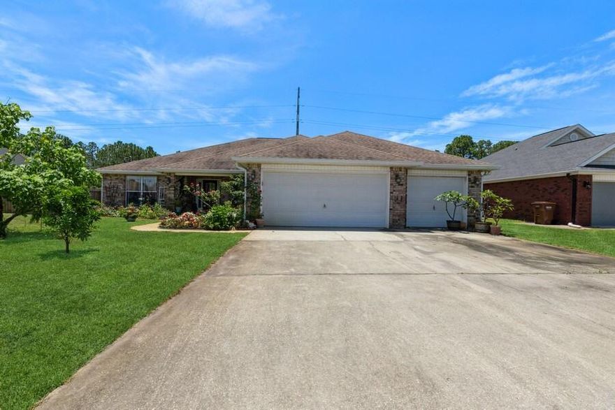 Incredible Navarre home!!! Spacious, grand, and beautiful! This home is settled right near a cul de sac so very little traffic! All five bedrooms are great size. Enjoy the private exit to the covered patio from your master suite for those evenings on the porch! Do you Need a large kitchen?! Its Gorgeous, oversized, and with a center island too! This home really has it all! Five bedrooms, three full baths, 3 car garage, and good size lot! Do not hesitate!