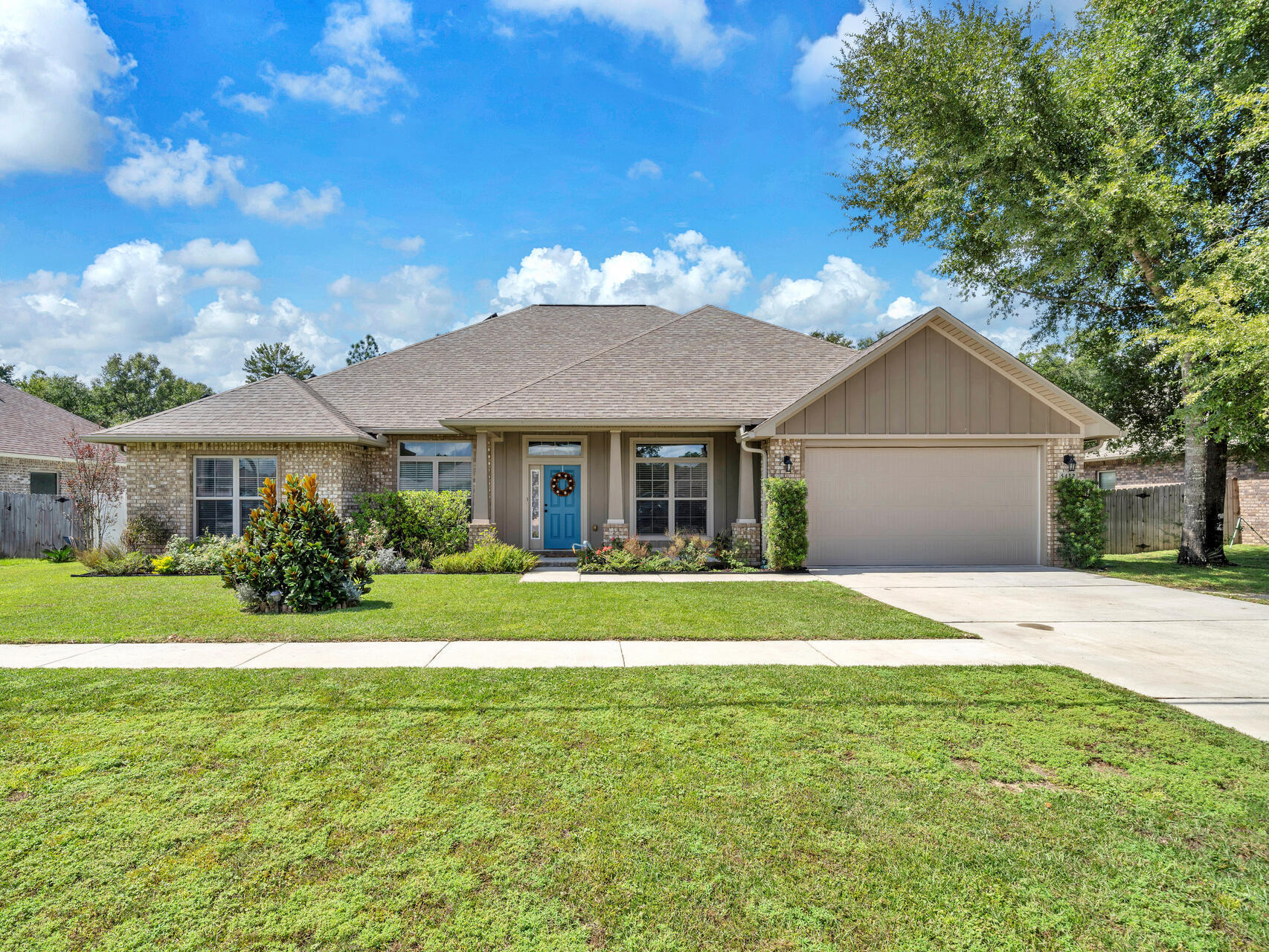 Welcome to this stunning 3,019 sq. ft. home, where modern elegance meets comfort in a tranquil setting. The heart of the home features a beautifully designed kitchen, showcasing luxurious granite countertops paired with custom maple cabinets adorned with crown molding. The open layout flows seamlessly into the breakfast area or separate dining room, perfect for casual dining or entertaining guests.Retreat to the expansive master bedroom, complete with spacious walk-in closets. The master bath is a spa-like oasis, featuring double vanities with granite tops, a tile shower with a half glass wall, and a beautifully tiled garden tub, creating an atmosphere of relaxation and luxury.Energy efficiency is a key highlight of this home, featuring raised ceilings that enhance  the spacious feel, a wireless thermostat for ultimate convenience, and energy-saving solar panels that will be paid off at closing. The tile flooring in the kitchen, breakfast area, laundry room, and bathrooms offers durability and easy maintenance, while the vinyl wood flooring in the foyer and dining room adds a warm, inviting touch.

Step outside into the impressive 25x14 Florida room, which opens up to a resort-style outdoor space. The 15,000-gallon heated pool, surrounded by elegant pavers, is perfect for year-round enjoyment. The pool area boasts a recently replaced pump (2024), an auto-fill system, and an in-floor cleaning system, ensuring pristine waters at all times. With a 10-year warranty remaining on the pool's pebble finish, you can relax and enjoy without worry.

The property is enclosed by a beautiful white vinyl privacy fence, providing a serene backdrop for your outdoor gatherings. Located in a non-HOA area and just outside of Crestview City taxes, this home offers both privacy and convenience. Enjoy proximity to Twin Hills Park, perfect for outdoor activities and family outings.

Don't miss your chance to own this exceptional home that blends luxury with practicality in a prime location!


