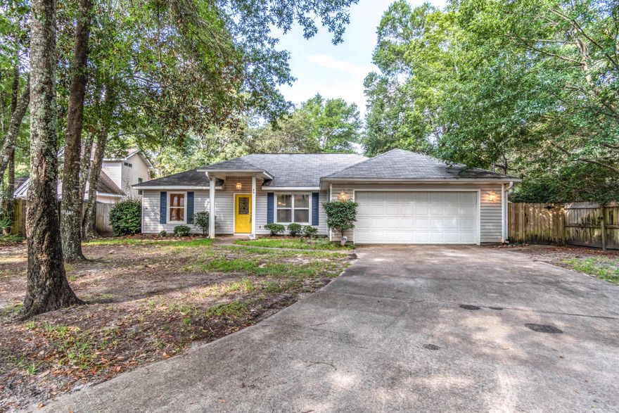 This perfectly located home is perfection inside and out! As you enter the spacious living room, you will love the wood floors and open floor plan. Vaulted ceilings and full length windows add plenty of light to this property. The dining room features a stunning fixture, wood floors, and glass doors boasting a view of the patio. Every cook will love the kitchen as it is enormous and has plenty of cabinets and counters for all your needs. The stainless steel appliances and wood floors add the finishing touch. The bedrooms are a split floor plan. All feature carpet and the master bedroom/bath has ceiling fan, trey ceiling, large walk in closets, and double cultured marble vanities. The two additional bedrooms also feature ceiling fans, floor length windows and large closets. New Roof coming