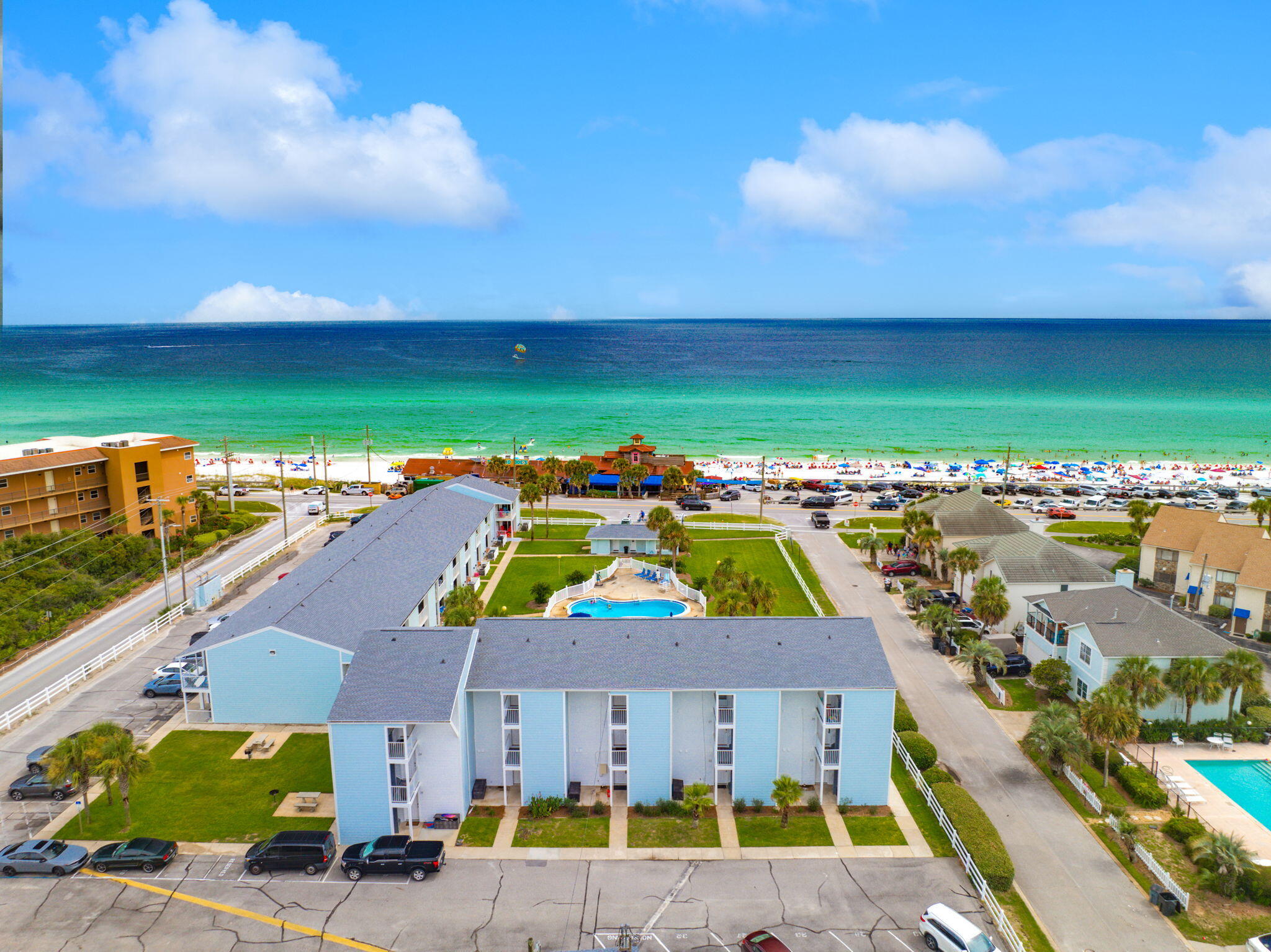 Investor-ready and beach-lover approved, Tradewinds Unit 1 is a rare chance to own a fully renovated, ground-floor condo just steps from the sand. This updated 2BR/2BA unit features stylish coastal interiors, private covered patio with views of the pool, and direct access to the beach. Perfectly positioned in the heart of Miramar Beach, you'll enjoy easy access to top dining, shopping, and family-friendly attractions. Whether you're searching for a personal beachfront retreat or a high-performing short-term rental, this unit checks every box for lifestyle and investment potential.*Tradewinds completed its Milestone inspection in 2024 and has undergone a full exterior renovation, including new impact-resistant windows and doors, updated siding, and fresh exterior paint.