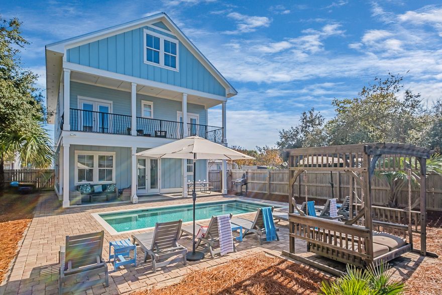 Located in the most desirable neighborhood in Destin, this Crystal Beach turnkey vacation home is a modern coastal masterpiece.  Less than 2 blocks from the best beach on the Emerald Coast, this 3-story breezy cottage boasts over 3,389 square feet of comfortable and tasteful living space.  This professionally decorated 7 bed/7bath property includes an open kitchen with quartz countertops and an impressive, oversized island.  Family style dining awaits at the large harvest table with convenient built-in bar and ice maker.  Post-beach relaxing is easily achieved in the comfortably furnished living room.  2 spacious king suites round out the main floor.  4 king suites, each with access to attached covered decks/porches, are on the second floor, along with a bonus family room.