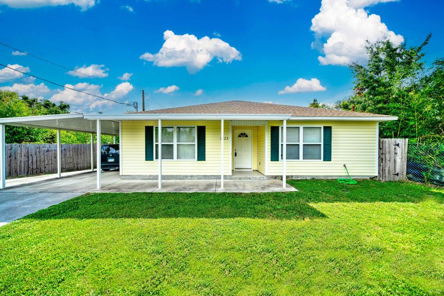 COZY + ADORABLE two bedroom home in a desirable location. This home is on a dead end street away from traffic. Walk in the large and open living and dining space. Ceramic tile through the living, kitchen, and dining area leaves the home with a polished, cohesive look. White cabinetry and updated light fixtures gives this space an elevated look. Featuring stainless steel fridge, stove, and microwave. Wine storage for an extra perk. Breakfast bar is perfect seating extra guests! Oversized utility closet featuring the washer, dryer, and extra storage! Enjoy privacy and peace in your backyard away from busy streets in the completely fenced in yard. Extra parking to the left of the carport is great for storing a small boat. There is public access to the bay W/ parking off Delwood!