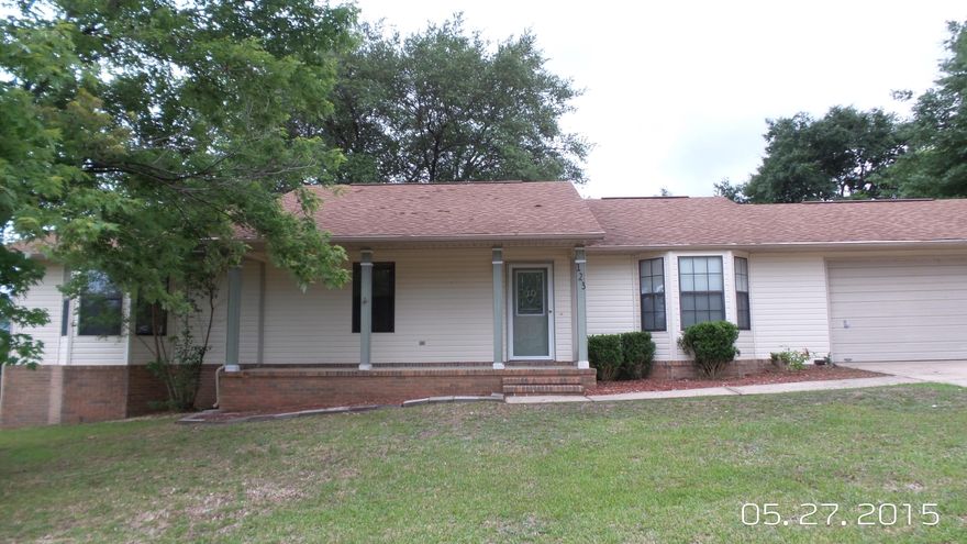 South Crestview home with easy access to military bases, beaches, and shopping. Features of this home include tile flooring throughout, vaulted ceiling in family room, open concept dining room with kitchen, large back deck with fire pit, and a huge fenced back yard on a LEVEL lot. This home lives large and is perfect for entertaining. This won't last long! Buyer to verify all dimensions.