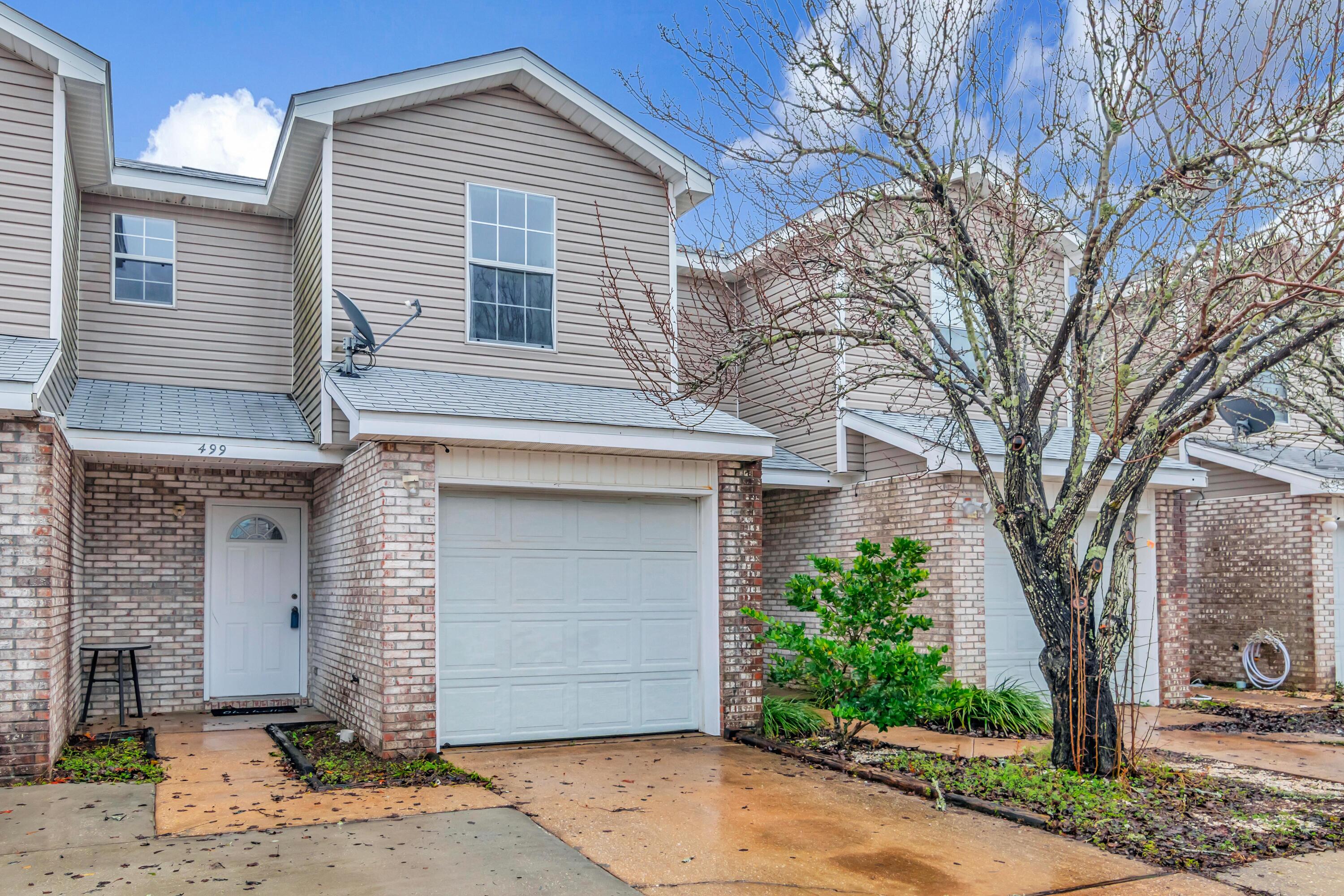 Ideal location for Air Force personnel seeking convenience and comfort! Only a mile away from Hurlburt Field, this move-in ready home is perfect for those who want to be near Highway 98 and all the local amenities. This townhome is updated and ready for you, featuring a roof replaced in 2016, a water heater replaced in 2016, a freshly painted interior in 2022, a new AC, 2020, new carpet in 2022, and best of all, it comes fully furnished! The functional floorplan offers plenty of space and flexibility, and the fully furnished townhome provides added convenience and value. Enjoy easy access to the beach and all the best local spots while never worrying about being late to work.