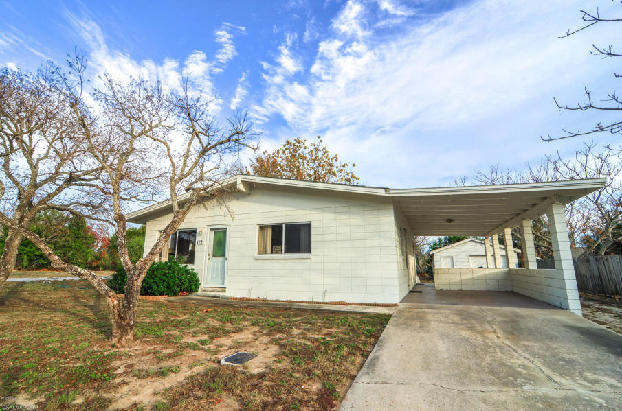 My, My, My! Another Laguna Beach opportunity to own a vintage block cottage, on a huge 75x125 lot, zoned R-2 and only half a block to the beach. This adorable home is being sold furnished and boy is it cute. Decorated with charm. There is a large detached garage that could be converted into another cottage or used just as it is. The zoning allows for more than one home on the lot and short term rentals are ok. The location is brilliant! Only a few blocks to the local beach market (known for its wine cellar and gift shop). There is also the local donut hangout down the street. A few minutes east is Pier Park and a few minutes west is Carillon Beach and 30A. Laguna Beach is a lifestyle, not just a place. Come and enjoy the golf cart community and the amazing beach.