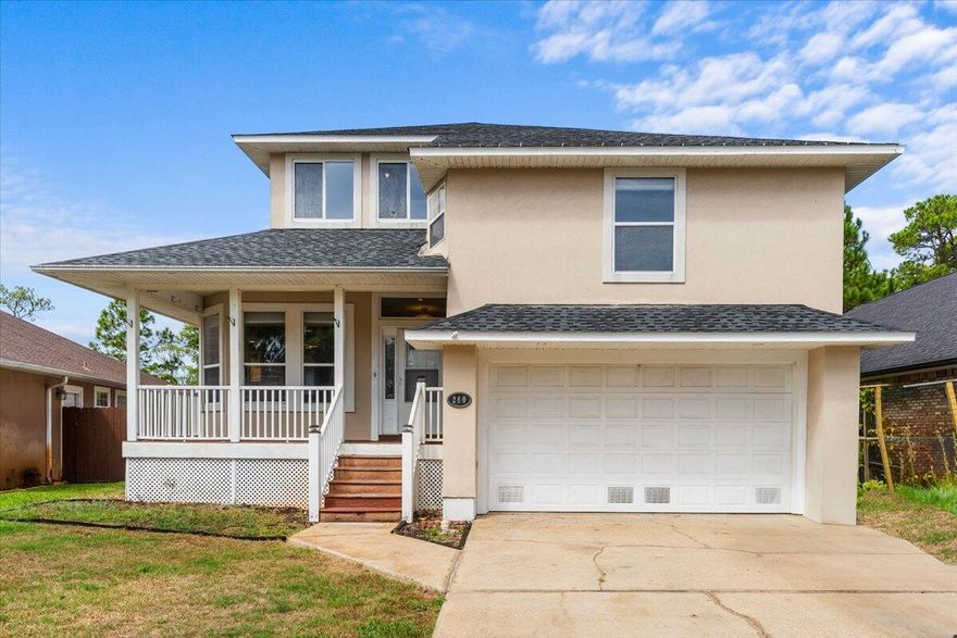 Beautiful and spacious four bedroom, three bathroom home located in a desirable gated community, just minutes from Hurlburt Field and Navarre Beach. Freshly painted interiors and new carpeting make this home move-in ready.A large front porch welcomes you into a wide foyer that sets the tone for the generous layout. The kitchen and dining area are conveniently located off the foyer and open to a bright and airy living room. A three-panel sliding glass door fully retracts, connecting the living room to a screened back porch and creating a seamless indoor-outdoor living experience. It is the perfect setting for entertaining or simply enjoying the fresh coastal air during mild weather.The main level includes a large bedroom with an en suite bathroom that also functions as a gues t bathroom for the living area. This bedroom has private access to the screened porch, offering a peaceful retreat.

Upstairs, two additional bedrooms and a full bathroom provide plenty of space for family or guests. A charming niche area adds flexibility for a reading corner or small office. Half a flight up, a spacious sitting area features abundant natural light and views of Santa Rosa Sound.

Through a set of French doors, the master suite offers a private escape with a kitchenette, a generous balcony overlooking the backyard, a walk-in closet with custom cabinetry, and a spacious bathroom with double vanity, garden tub, and separate shower.

The roof was replaced in 2024, and the home features two HVAC systems for year-round comfort. This property combines thoughtful design with beautiful surroundings, making it a must-see.