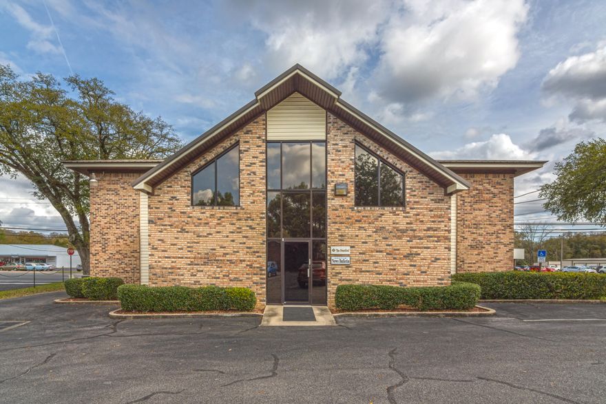 Professional office space with highway frontage and great visibility! The building is two story w/ the downstairs (2192 sq ft) occupied by a local newspaper with a remaining 4 year lease. Both downstairs and upstairs (2348 sq ft) consist of several office spaces, conference, break room, etc... Location has a good daily traffic flow and is located among many other businesses! Schedule your private showing of this great commercial space ASAP!