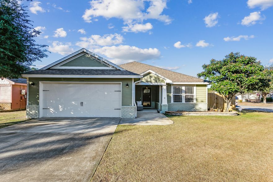 Back on the market-no fault of sellers! Move in ready 4 bedroom, 2 bathroom home in Cottages At E. River neighborhood of Navarre with lots of builder upgrades on a corner lot.  New exterior paint and new privacy fence all enhance this home's curb appeal.  As you walk in,the home has an open floor plan with new flooring, new paint, and beautiful crown molding.The kitchen has granite countertops, a breakfast bar overlooking the dining area, stainless appliances with a new dishwasher. The primary bedroom has trey ceilings, and a primary bathroom with a new oversized tub, double vanities, granite countertops and a walk in closet. Three additional bedrooms and an additional full bath with double vanity. The screened back patio overlooks the backyard with a yard building ( As-Is) and playset.