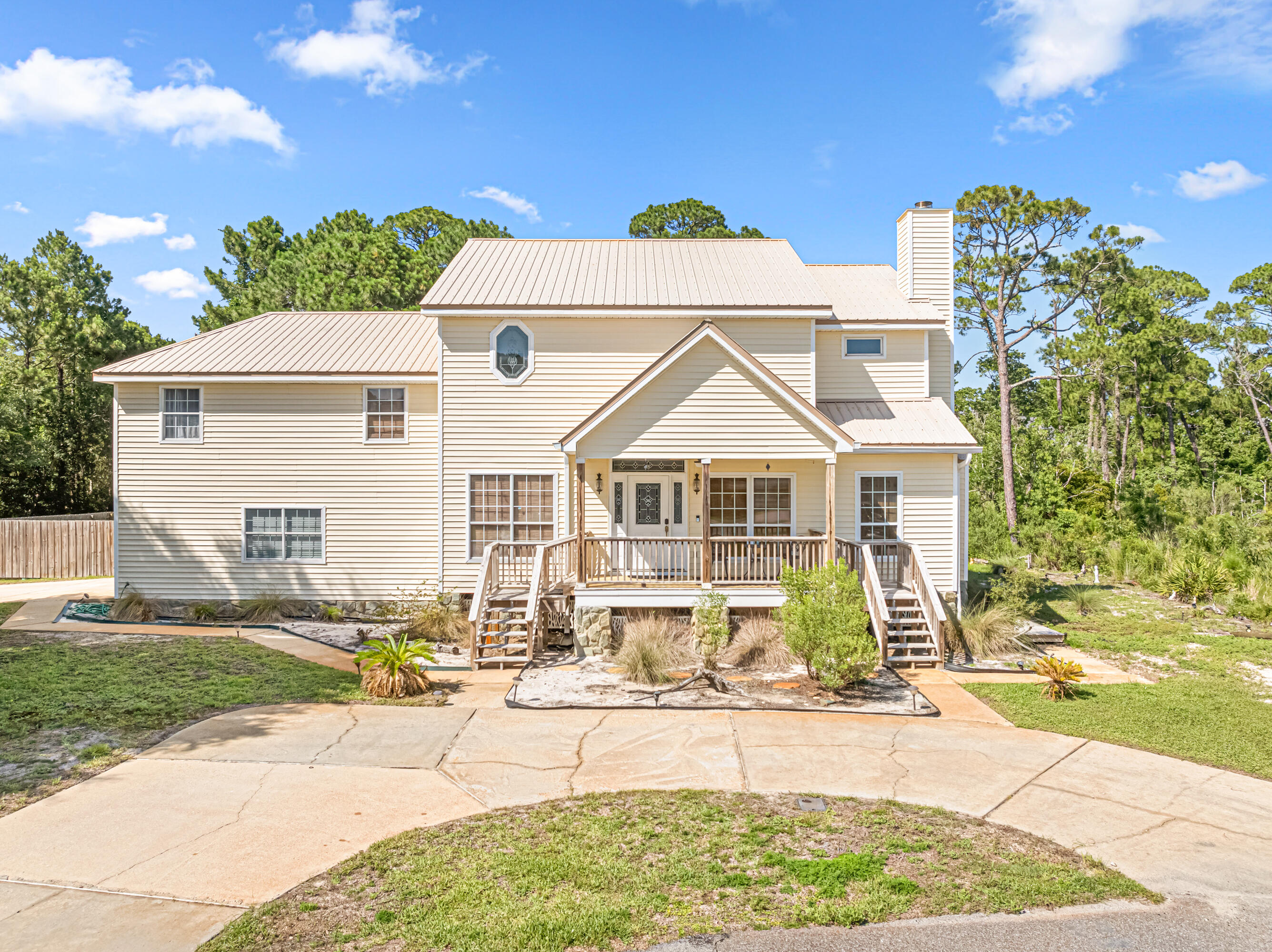 Welcome to 409 Emerald Court -- a coastal retreat tucked away on a peaceful cul-de-sac in the desirable Emerald Pointe community! This two-story gem sits proudly on a generous corner lot, offering sweeping VIEWS of the Santa Rosa Sound and a lifestyle that blends relaxation with functionality.From the moment you arrive, you'll be impressed by the circular pull-through driveway, extra side parking perfect for your boat, RV, or jet skis, and a spacious two-car garage with side entry. Inside, natural light fills the open-concept living and dining areas, highlighted by soaring ceilings, a stunning gas fireplace, and a striking curved staircase. The kitchen is both stylish and functional, featuring stainless steel appliances, granite countertops and backsplash, a large pantry, breakfast bar, and cozy dining nook with access to the backyard.
One of the home's standout features is the bright Florida room perfect for entertaining or peaceful mornings with a view. This inviting space includes a wet bar with sink and mini-fridge and overlooks the Santa Rosa Sound.
Upstairs, you'll find two comfortable bedrooms, a full bath with generous storage, and a versatile laundry room with built-in desk area ideal for crafts or a home office. The private master suite occupies its own upper level and features vaulted ceilings, his-and-hers closets, a spa-like bath with jetted tub and water views, plus access to a second-story deck. Just off the master is a hidden bonus room with sitting area and kitchenette perfect for a media room or private retreat.
Additional upgrades include elegant trim and molding, no carpet throughout, ample storage, two HVAC systems, and natural gas. Emerald Pointe offers optional HOA membership for just $225/year, which includes private beach access a rare perk that completes the Florida lifestyle.
Don't miss this exceptional opportunity to own a unique, water-view home with room to relax, entertain, and enjoy all that coastal living has to offer.