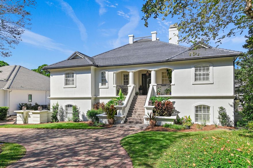 Discover luxurious coastal living in this exceptional 6 bedroom home located in the prestigious gated community of Regatta Bay. Perfectly positioned on the golf course. Step inside to find a spacious thoughtfully designed floor plan featuring two living areas, two fully equipped kitchens with gas appliances perfect for entertaining family and friends. The home is equipped with an elevator for easy access to all floors. Enjoy resort style amenities including a private pool, hot tub, outdoor gas fire pit and a mudroom.  The property also has a laundry room on each floor and a dedicated office as well as a separate wine room, a two car garage and a separate golf cart garage, making it ideal for both relaxation and practicality. This home has a new roof and the yard is completely fenced in. Regatta Bay's unique location where residents can easily reach the beach or shopping via golf cart makes this home truly one of a kind.  