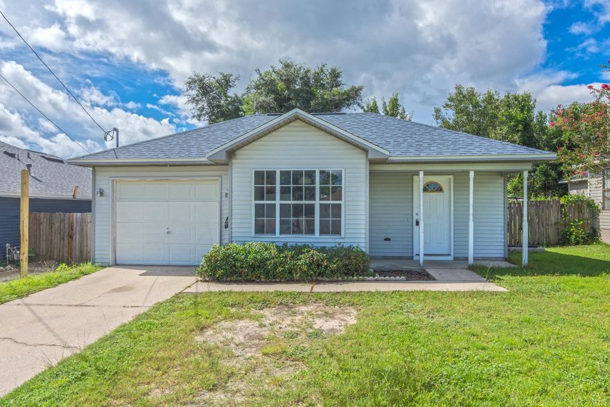 Only from six miles from Duke field and twenty five miles from Eglin Air Force Base! Fully remodeled!! 3 bedroom, 2 bath home with garage! As you enter the living room you will notice the beautiful wood tile floors, ceiling fan and neutral walls. The dining room opens into the new kitchen with new grey cabinetry, granite counters, and stainless steel appliances to include a fridge, stove, dishwasher, and microwave. The bedrooms are spacious and have tile wood floors and full length mirror closet doors. All bedrooms have ceiling fans. Both bathrooms have been renovated with new cabinets and granite counters. There is a nice backyard for your outside enjoyment. This home also has a one car garage and is located off of PJ Adams in South Crestview.