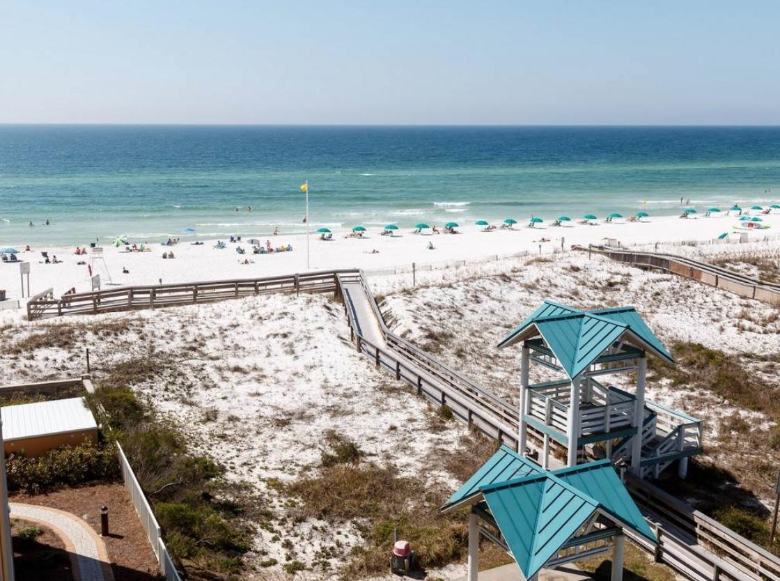 Owner says SELL so we've lowered the price almost $65,000. You must see this one! This is a gorgeous first stack coastline view unit. Fabulous view of the Gulf of Mexico. Unit has been upgraded and has wood look tile floors throughout living areas, new air conditioning system, new dishwasher, crown molding, stainless steel appliances, maple cabinets, granite countertops. The Azure has great amenities. Covered parking, two Gulf front pools (one heated), two hot tubs, kid's mushroom spray park, picnic area with grills, exercise room....the list goes on and on. This beautifully decorated 3 bedroom 2 bath unit has a million dollar view of the Gulf of Mexico with its sugar white beaches and crystal clear water. Located on the 5th floor, the balcony is huge and the