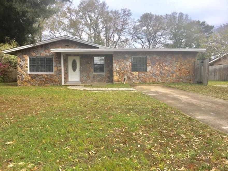 LOCATION, LOCATION, LOCATION! This wonderful home is located in the middle of everything! Completely remodeled in 2017- HVAC, Roof, Water Heater, Flooring, Paint, Kitchen, Bathrooms, Fixtures- Everything! Beautiful wood flooring throughout & tile in the bathrooms. Kitchen has all stainless steel appliances in place. Soft close kitchen & bathroom cabinets/drawers. All bedrooms have ceiling fans. Neutral grey paint throughout. Master bedroom has a walk in closet & shower only. Storage closet off back of home features shelving & the washer & dryer hook ups. Home also has a covered back patio & large privacy fenced backyard great for entertaining & relaxing. Lawn pump/sprinkler system on a timer for easy lawn care. Yard building for your extra stuff. Covered front porch as well. Double sided