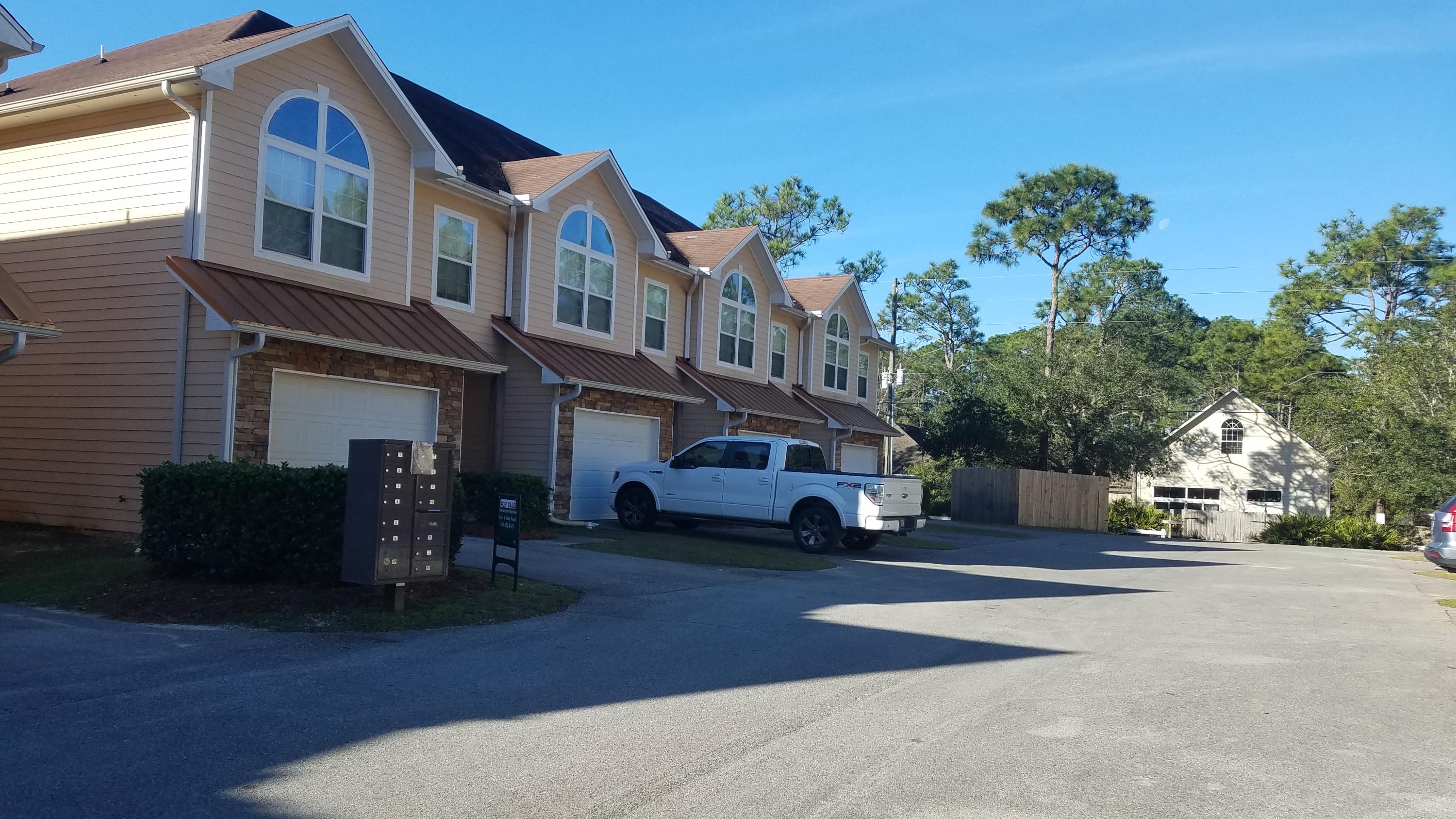 A best buy! Wonderful 3 bedroom, 21/2 bath unit that has brand new kitchen appliances and lovely wood laminate floors throughout except tile baths upstairs. Stonegate does have a pool that is shared by only 12 units Fabulous location just 11/2 mile from Sacred Heart Hospital in South Walton. This unit is vacant and ready for a new owner. Park in the garage. This is a best buy. Perfect for second home, investor or primary residence. This unit can be rented for 6 months at $1600/ mo.