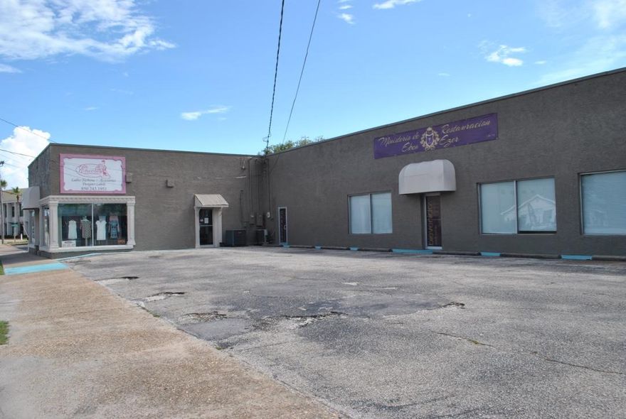Retail building with a great visibility right at the busy intersection in Fort Walton Beach (Eglin Parkway and Perry Ave). Total size is 4649 sqft. Currently, the property is split into two units: ~2000 sqft is occupied by a church and ~2600 sqft is occupied by a surf shop. However, two units can easily be combined into one. There are two restrooms (one in each side) and a roll up door.