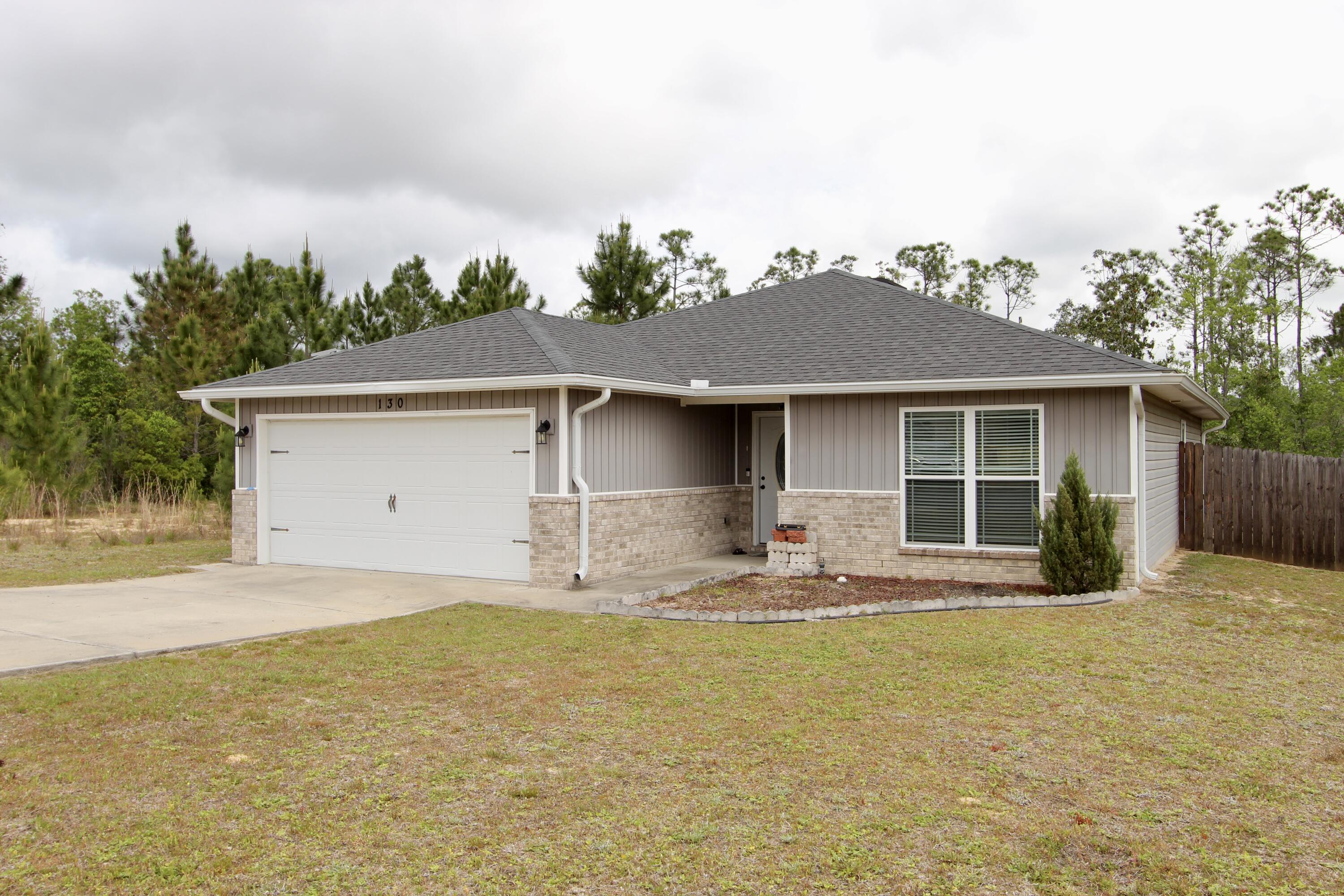 Charming 3-Bed, 2-Bath Home in Desirable South Crestview - Taylor Farms Subdivision!Welcome to this beautifully maintained home nestled in Taylor Farms community in South Crestview! Boasting 3 bedrooms and 2 bathrooms, this residence offers the perfect blend of comfort, style, and convenience--with an easy commute to military bases, stunning beaches, schools, and shopping. Step inside to an inviting open-concept layout featuring a spacious living room that seamlessly flows into the upgraded kitchen, complete with stainless steel appliances, granite countertops, and custom lighting. The custom front door adds a unique touch of curb appeal, while gutters around the home offer added peace of mind. Retreat to the roomy master suite featuring dual vanities, a relaxing garden tub, and a separate walk-in shower. Enjoy year-round comfort in the screened Florida room overlooking the private, fenced-in backyard, perfect for morning coffee or evening relaxation. Schedule your private showing today before it's gone!