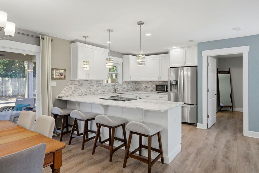 Welcome to Villa Venyce in Gulf Breeze, Florida, a beautifully remodeled home where modern updates meet timeless comfort.Tucked away in this peaceful and well-kept neighborhood, the home immediately captures your attention with its charming curb appeal. Mature shade trees, fresh landscaping, and a welcoming presence set the tone as you arrive. The property features a double-car garage, a fenced backyard, and plenty of outdoor space to enjoy the Florida lifestyle. Step inside and you'll immediately notice that this home feels much larger than the square footage suggests. The thoughtful layout and abundance of natural light create an open and inviting atmosphere throughout.

This home offers three full-size bedrooms and two full bathrooms, all completely remodeled with the quality and craftsmanship buyers are looking for today. The 2025 renovation transformed the home from top to bottom, blending modern design with everyday functionality.

Recent improvements include:

" Fully upgraded cabinetry and interior finishes

" Updated lighting throughout the home

" New roof

" New HVAC system

" New water heater

" Brand new ductwork replacing the original 1990s components

As you walk through the home, you'll notice the attention to detail in every room. From the fresh walls and modern fixtures to the thoughtfully selected finishes, the home truly feels like stepping into new construction again--without the new-construction price tag.

Outside, the property also features full irrigation to support the lawn and front planter beds, helping maintain the beautiful curb appeal year-round.

Villa Venyce offers the perfect blend of affordability, style, and move-in readiness, making it an excellent opportunity for buyers looking for a fully updated home in the heart of Gulf Breeze.

The seller can offer a flexible closing timeline to accommodate a buyer's needs. Serious showings only at this time, and be sure to keep an eye out for upcoming open house events.

Come experience this adorable and completely refreshed Gulf Breeze home for yourself.

