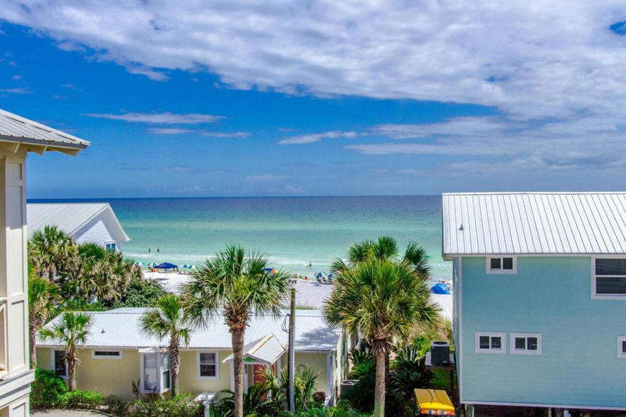 Welcome to 'Seas The Day', a charming beach home located in Summer's Edge community right in the heart of Seagrove on the east side of Scenic 30A.  Enjoy gulf views and a short walk to the gated beach access.  This home has 3 bedrooms, please an additional bonus room which functions as a 4th sleeping space.  Sold fully furnished, with a strong rental history of over $110,000 in gross rental income for 2021 with the potential to do even more.  As you enter the first floor of this beach home, you will appreciate the convenient foyer with a coat rack and storage area.  There are also two bedrooms and one fully bathroom located on the first floor, along with a full sized washer and dryer.